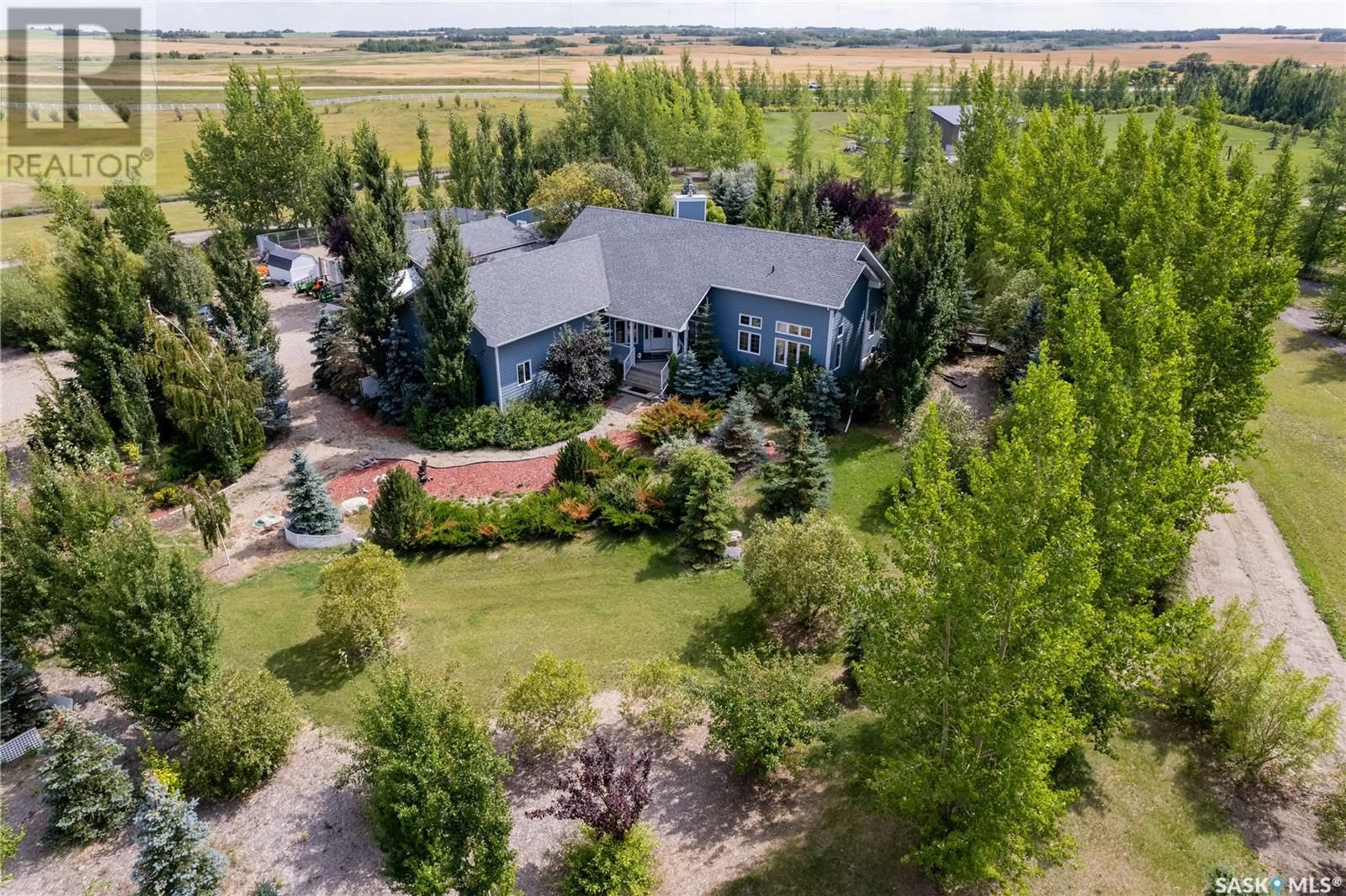 A pic from outside/outdoor area/front of a property/back of a property/a pic from drone, unknown for 117 Prairie LANE, Aberdeen Rm No. 373 Saskatchewan S7A0A6