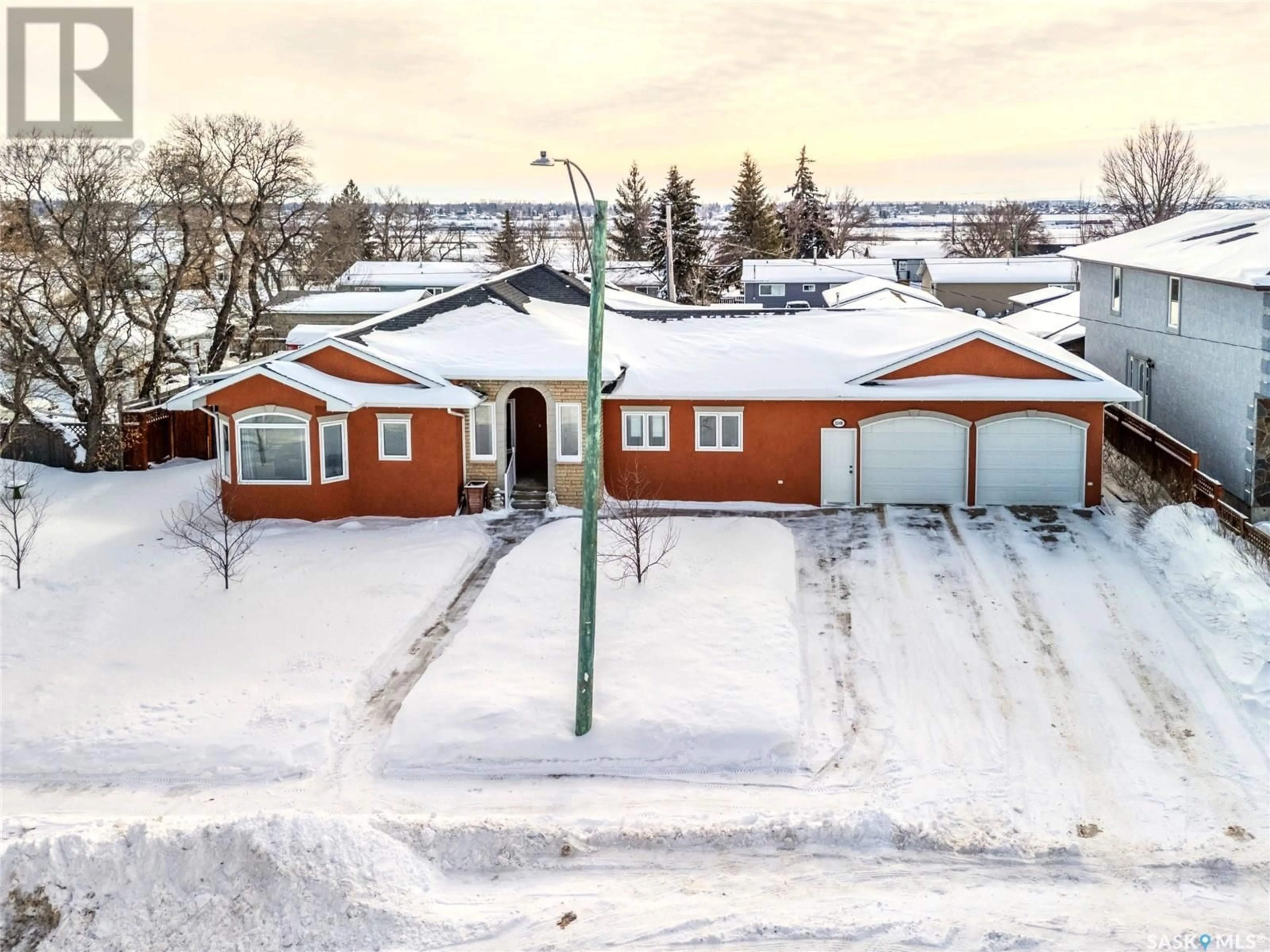 A pic from outside/outdoor area/front of a property/back of a property/a pic from drone, street for 1509 Athabasca STREET W, Moose Jaw Saskatchewan S6H6C2