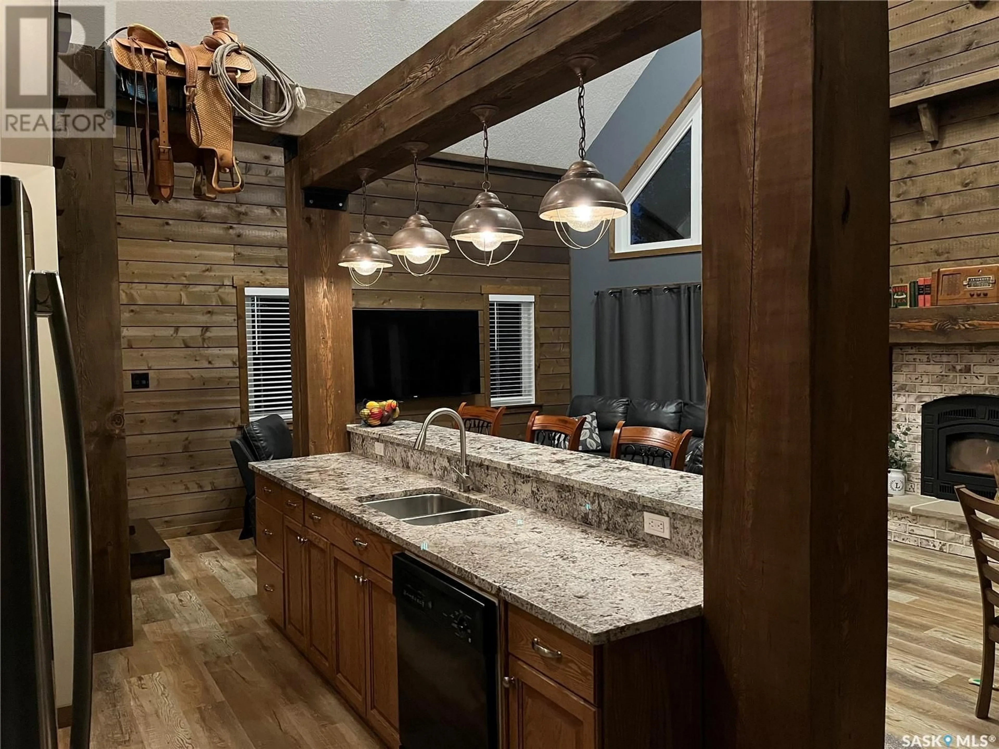 Rustic kitchen, wood/laminate floor for 1006 Alexander DRIVE, Lac Des Iles Saskatchewan S0M1A0