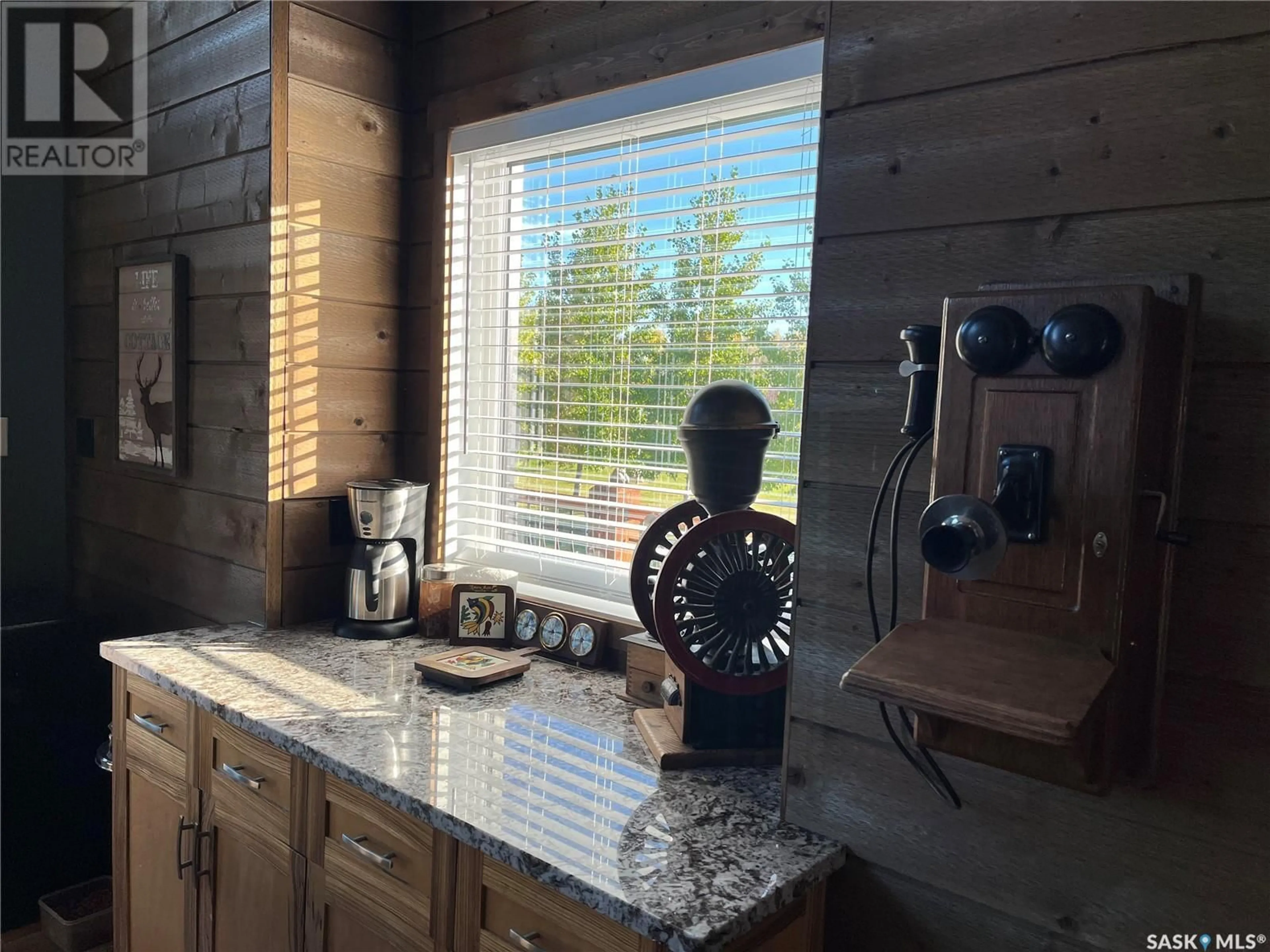 Rustic kitchen, wood/laminate floor for 1006 Alexander DRIVE, Lac Des Iles Saskatchewan S0M1A0