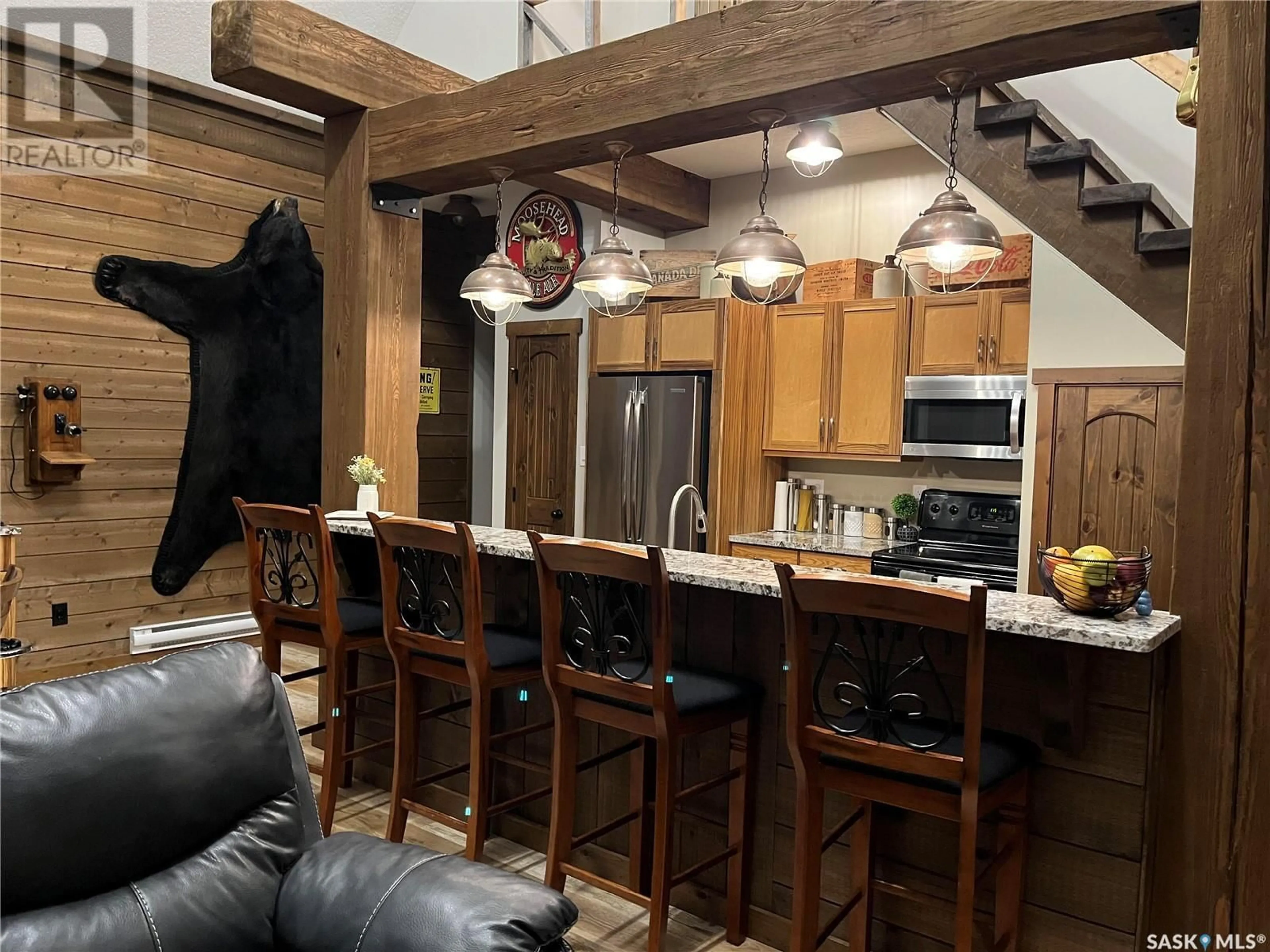 Rustic kitchen, wood/laminate floor for 1006 Alexander DRIVE, Lac Des Iles Saskatchewan S0M1A0