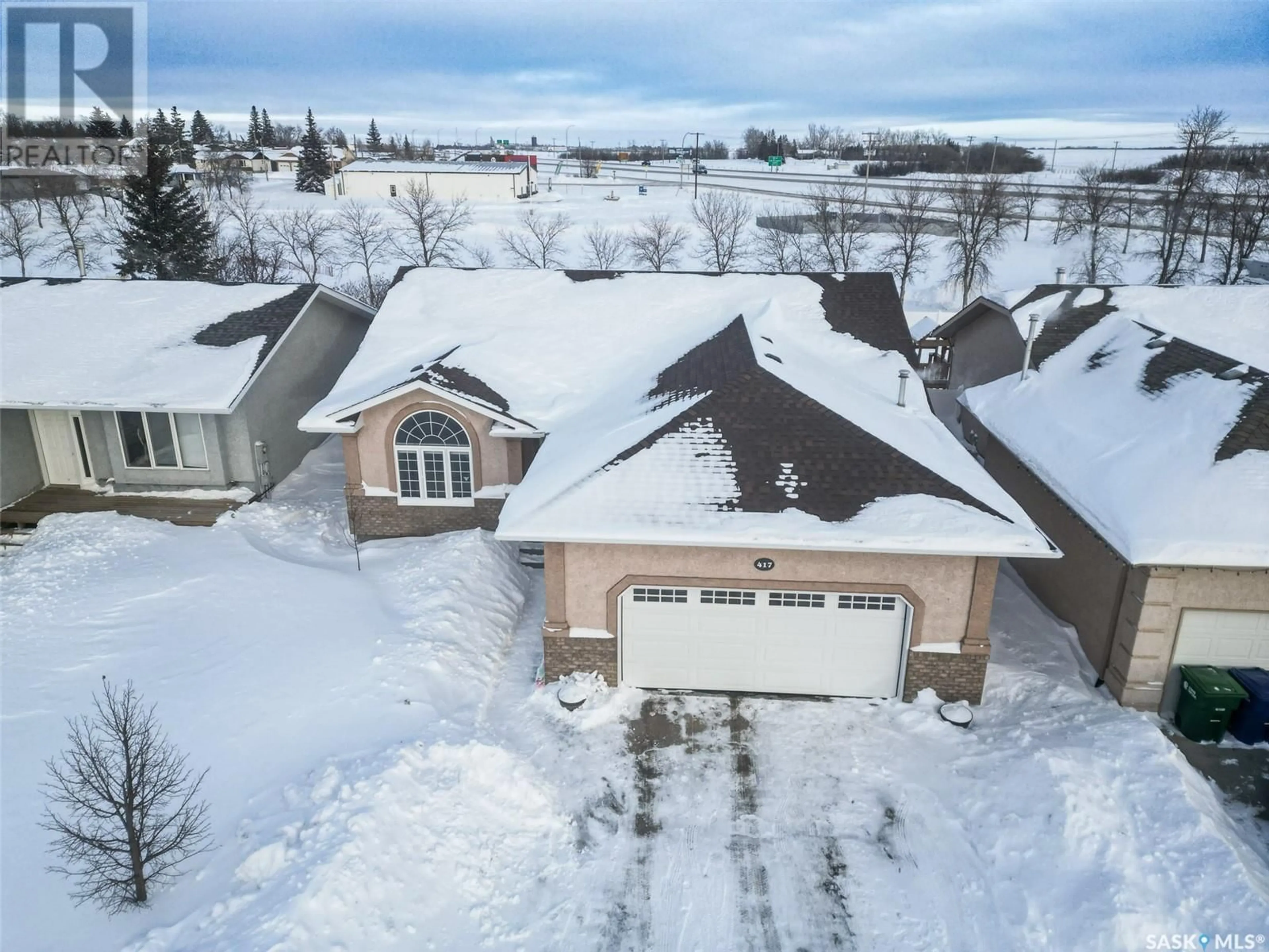 A pic from outside/outdoor area/front of a property/back of a property/a pic from drone, street for 417 HAWKES STREET, Balgonie Saskatchewan S0G0E0