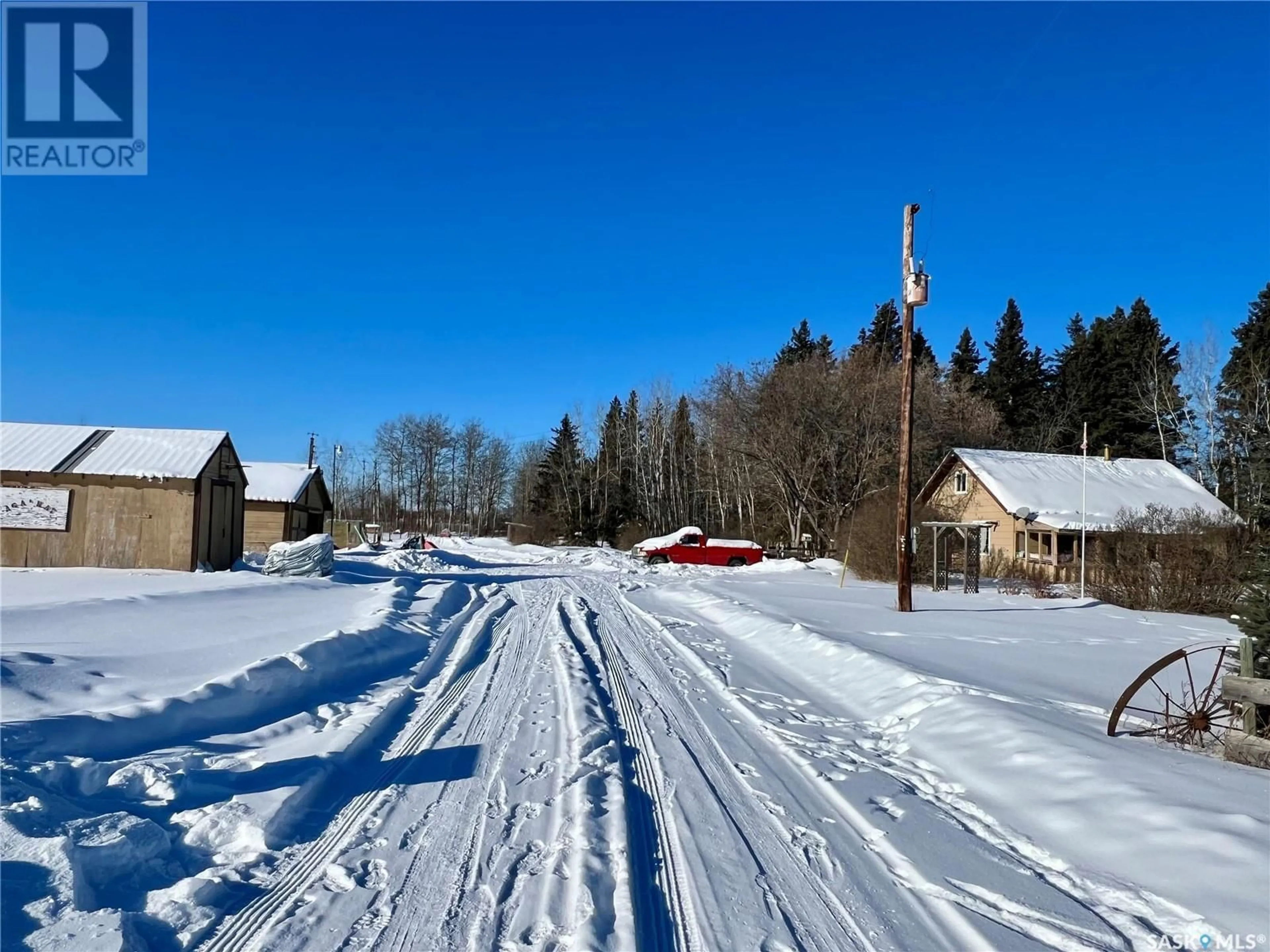 A pic from outside/outdoor area/front of a property/back of a property/a pic from drone, street for Compass Road, Rapid View Saskatchewan S0M2M0