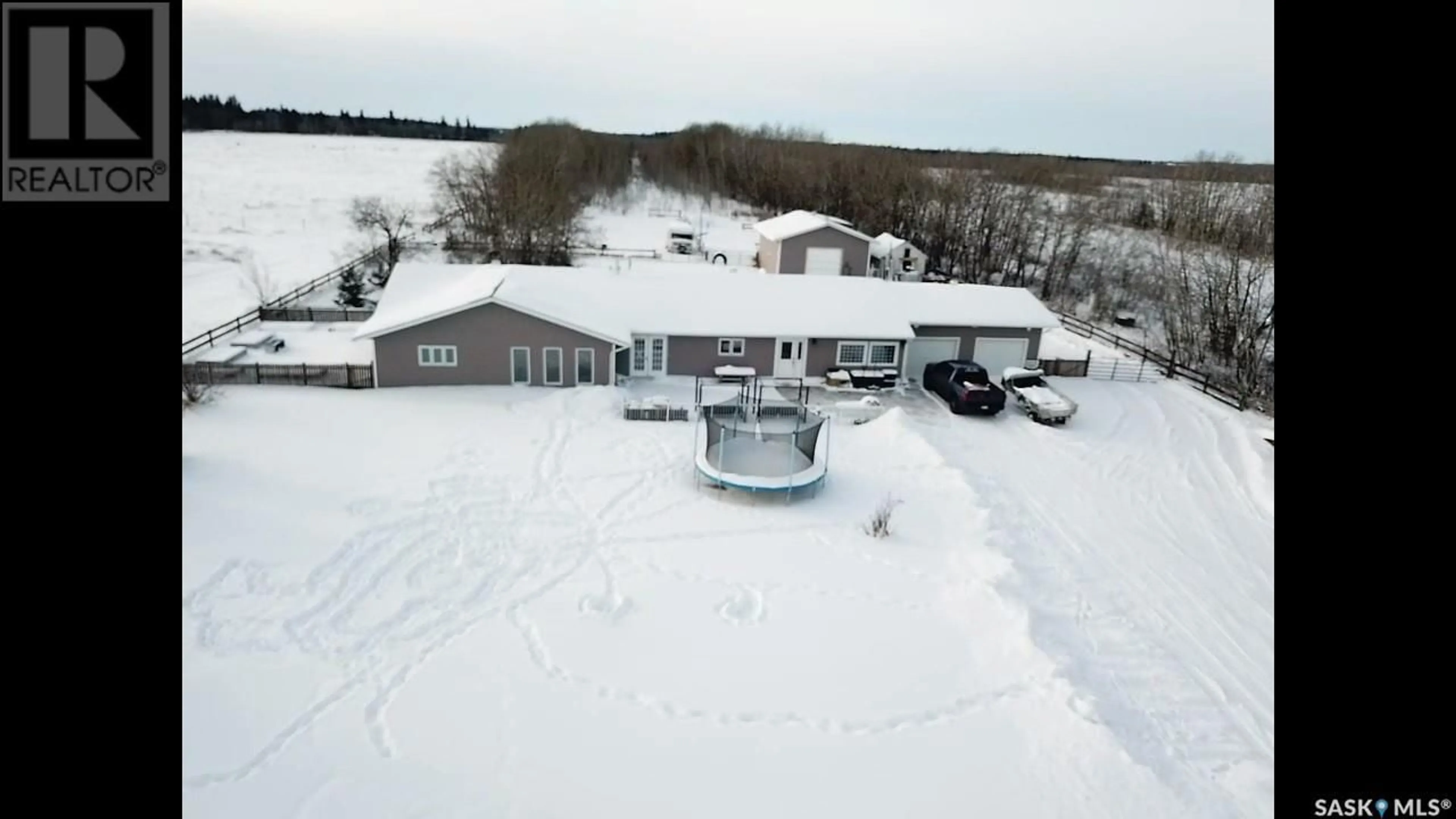 A pic from outside/outdoor area/front of a property/back of a property/a pic from drone, building for Wheatley Road Acreage, Spruce Home Saskatchewan S0J2N0