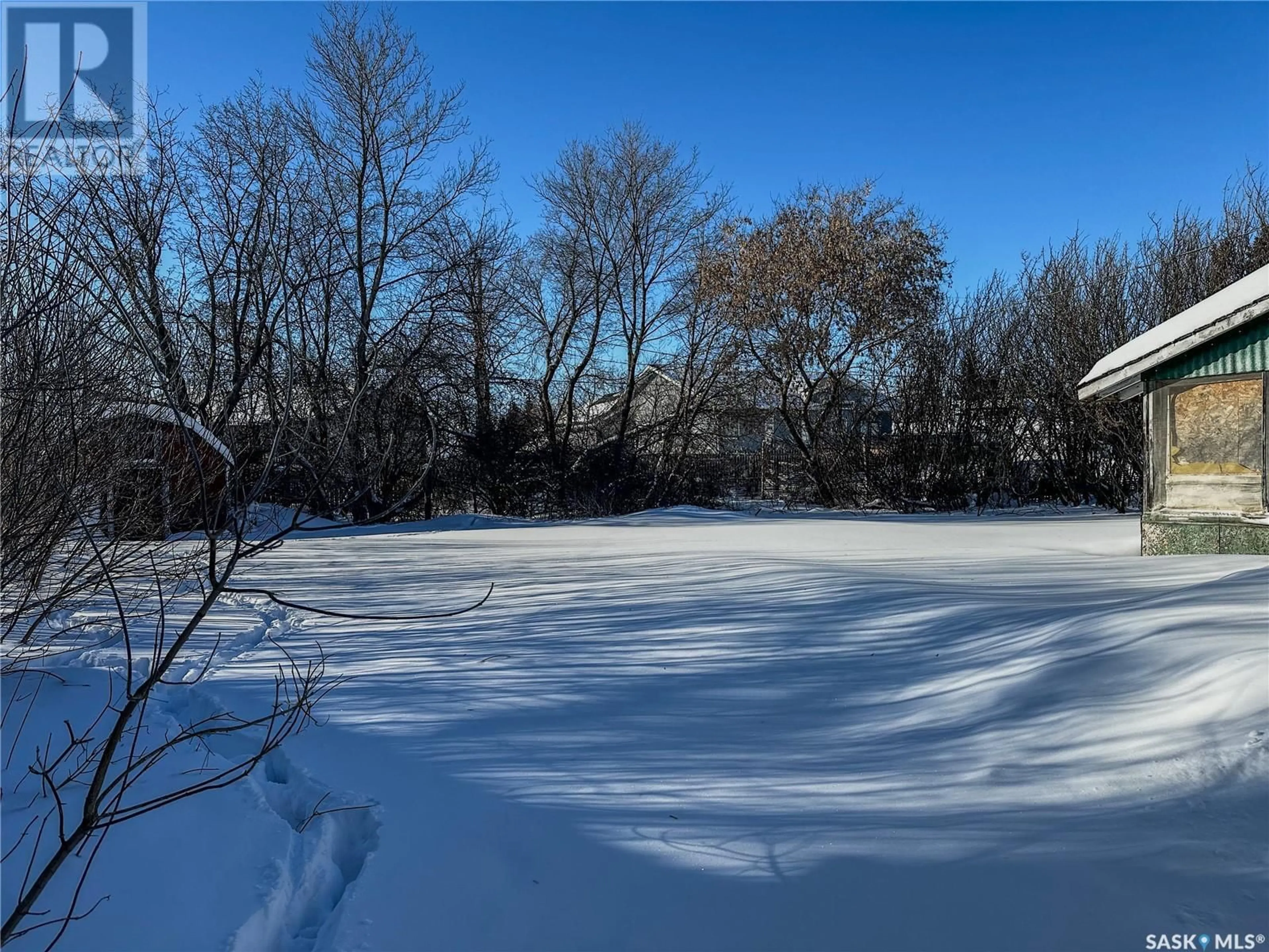 A pic from outside/outdoor area/front of a property/back of a property/a pic from drone, water/lake/river/ocean view for 212 Schafer STREET, Esterhazy Saskatchewan S0A0X0