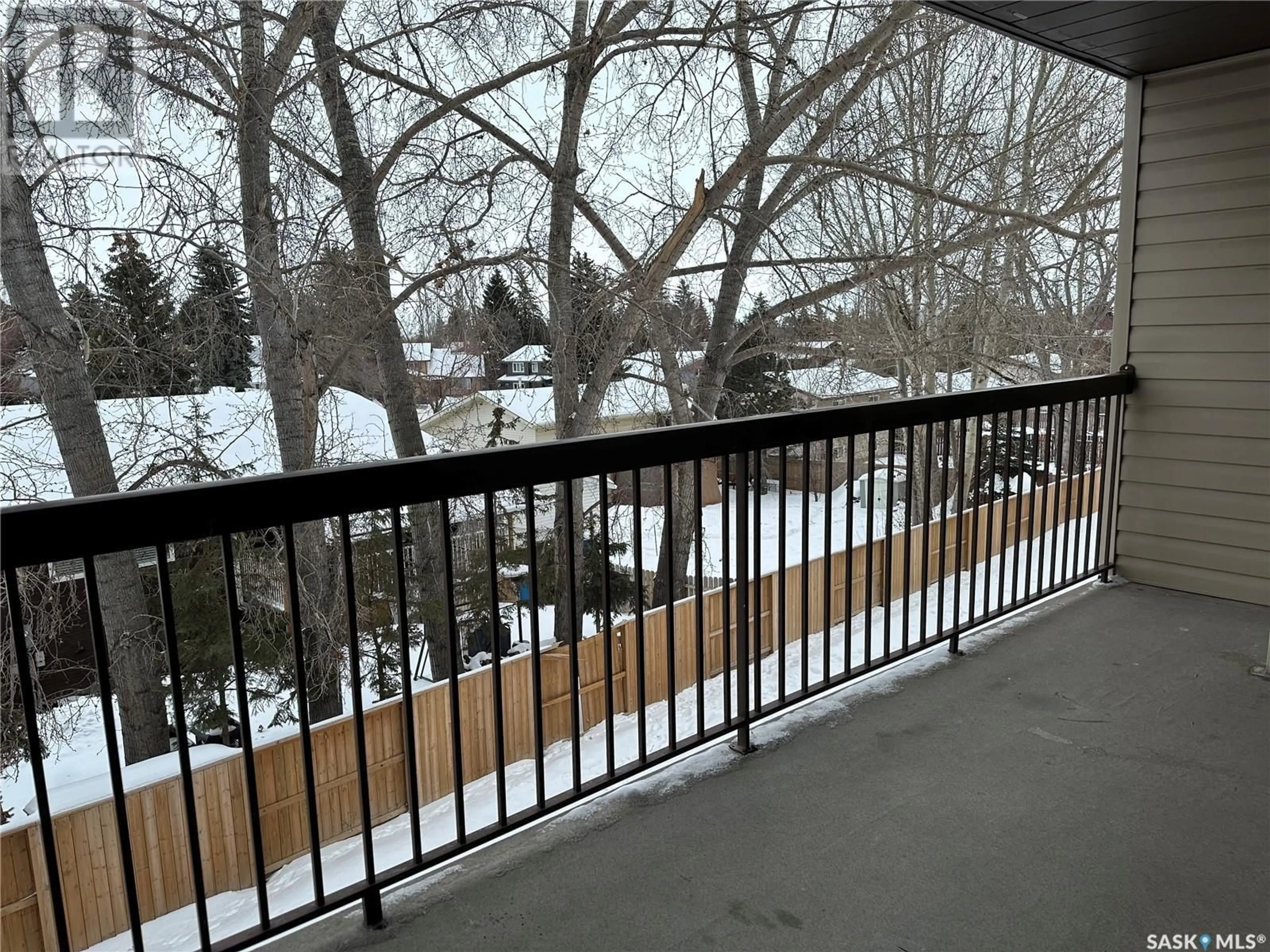 Balcony in the apartment, city buildings view from balcony for 204 225 Kingsmere BOULEVARD, Saskatoon Saskatchewan S7J4J6