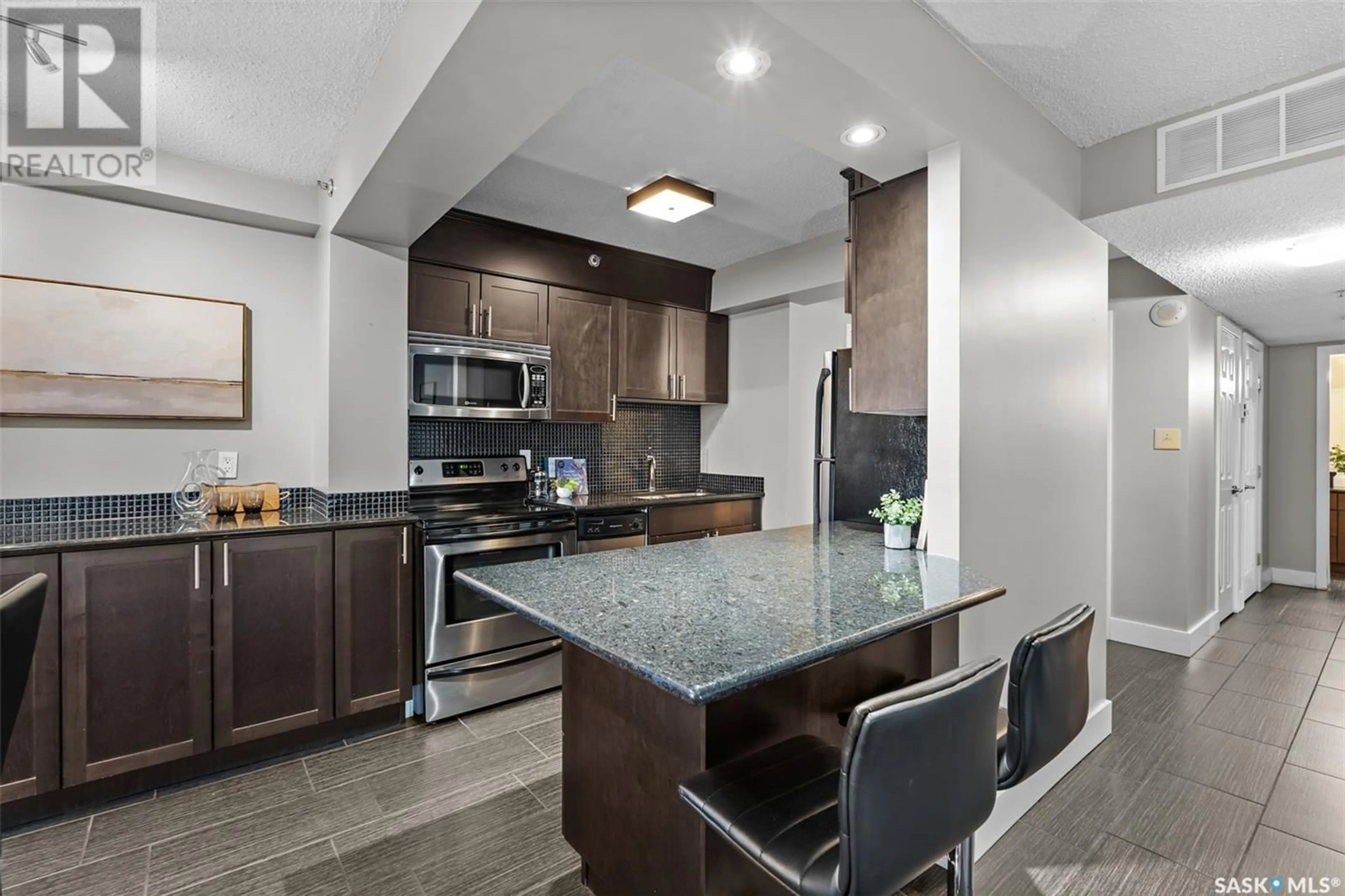 Open concept kitchen, ceramic/tile floor for 602 320 5th AVENUE N, Saskatoon Saskatchewan S7K2P5