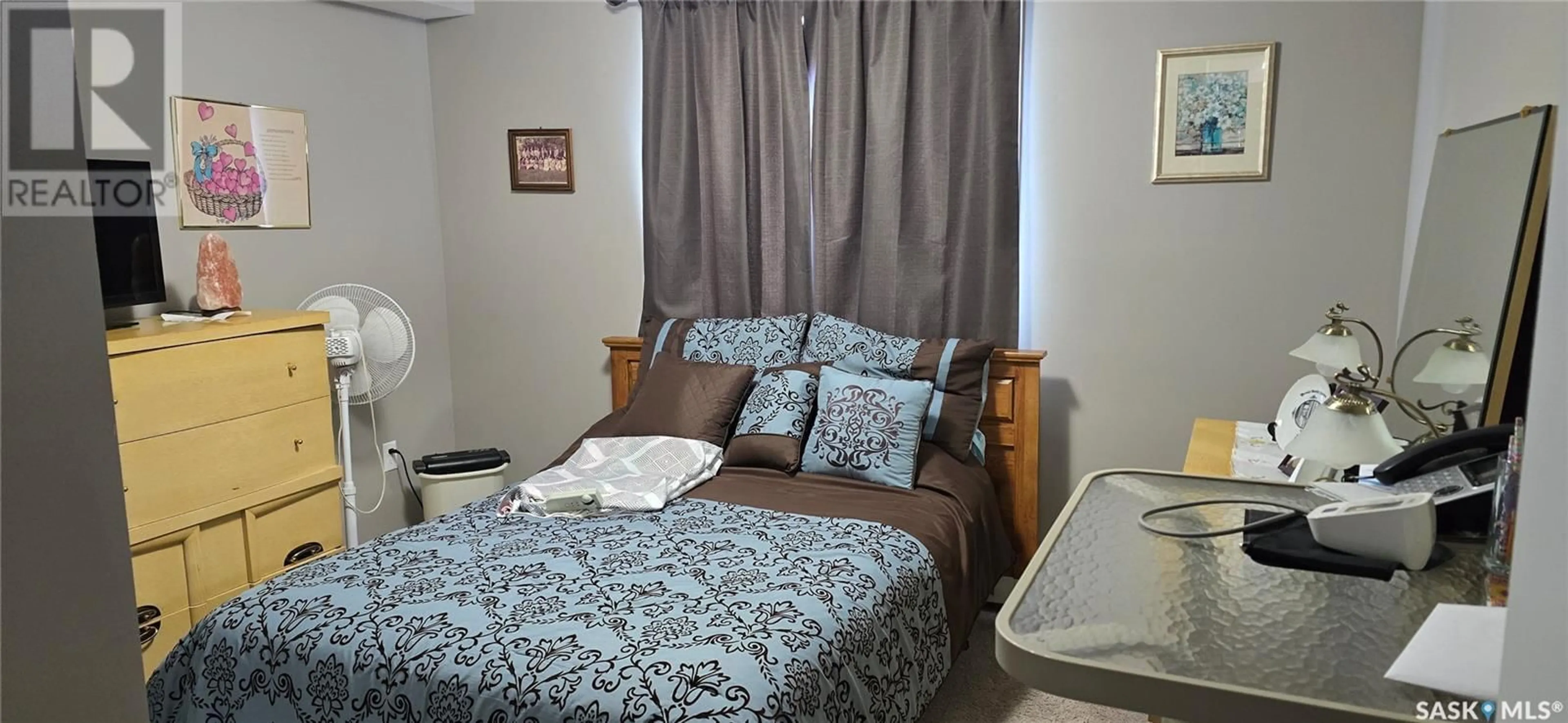 Bedroom with bed, unknown for 201 2141 Larter ROAD, Estevan Saskatchewan S4A2Y5