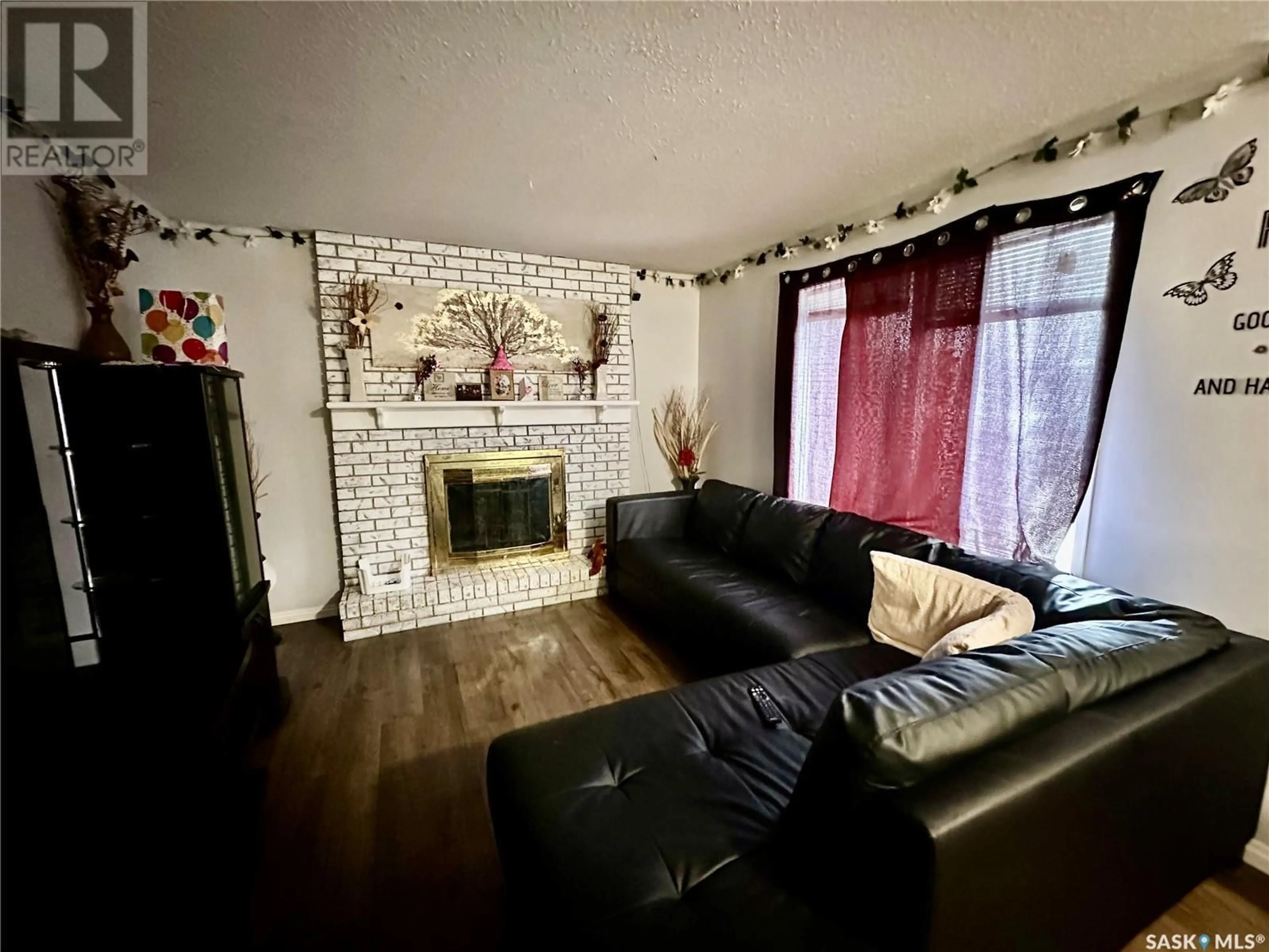 Living room with furniture, unknown for 1301 98th STREET, North Battleford Saskatchewan S9A0M1