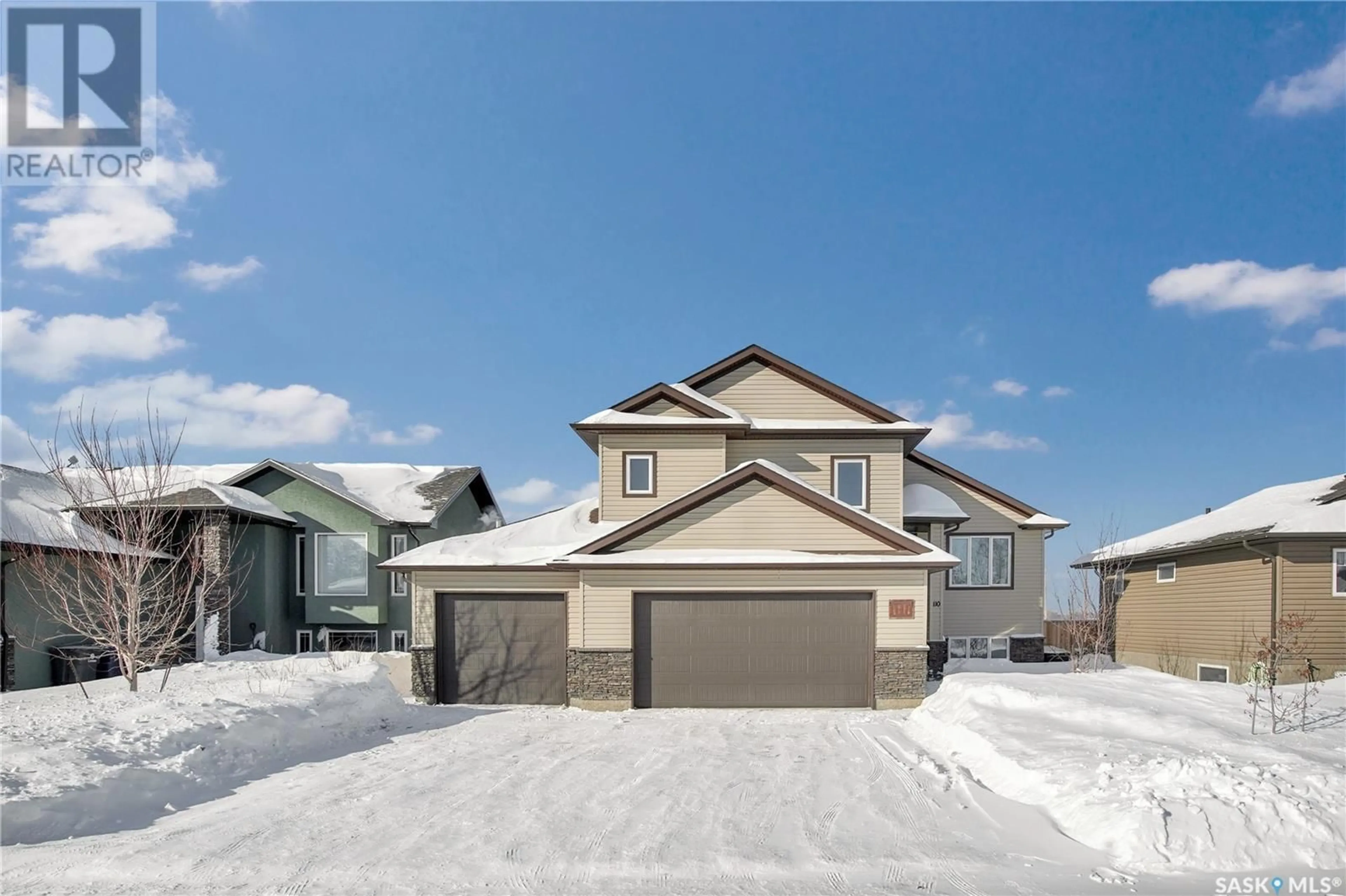 Home with vinyl exterior material, street for 110 Olauson CRESCENT, Vanscoy Saskatchewan S0I3J0