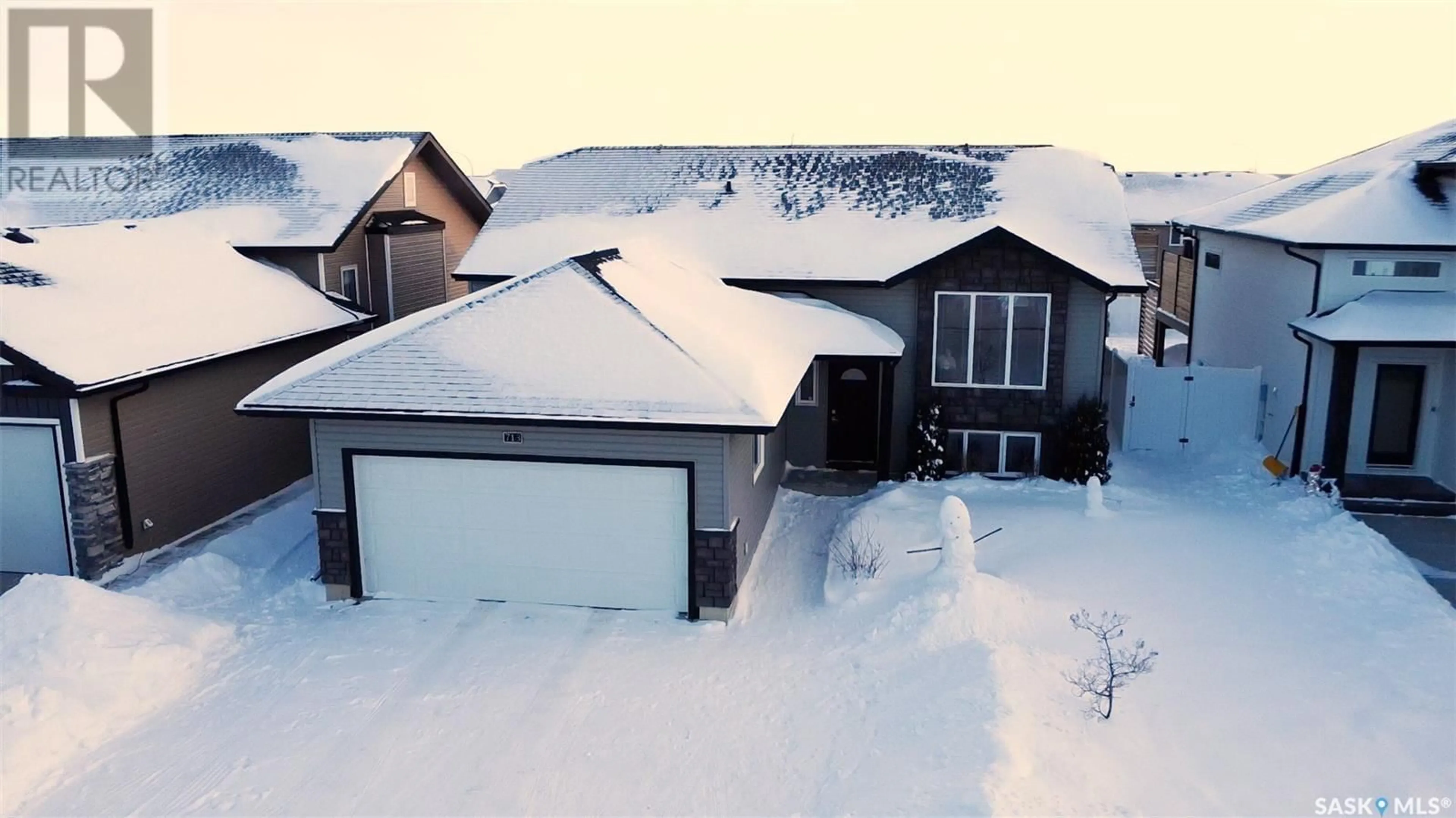 A pic from outside/outdoor area/front of a property/back of a property/a pic from drone, street for 713 Sarazen DRIVE, Warman Saskatchewan S0K4S4