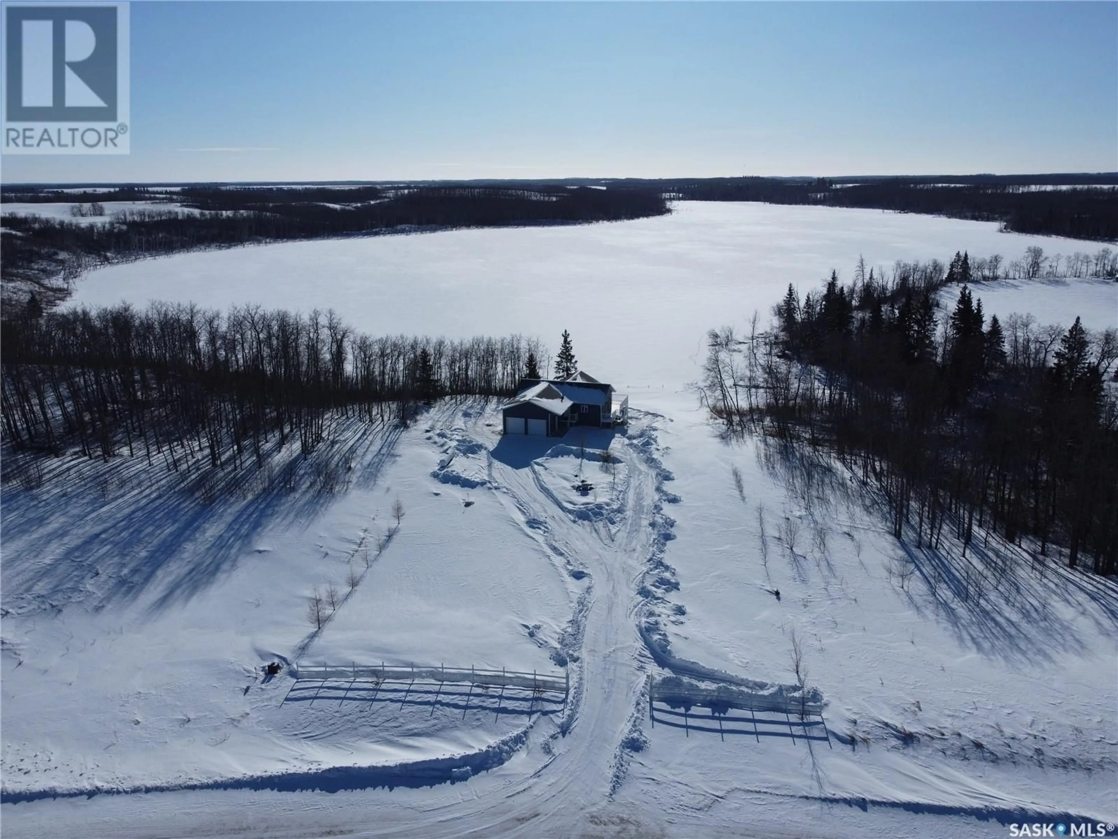 A pic from outside/outdoor area/front of a property/back of a property/a pic from drone, water/lake/river/ocean view for 14 CRESCENT BAY ROAD, Canwood Rm No. 494 Saskatchewan S0J0K0