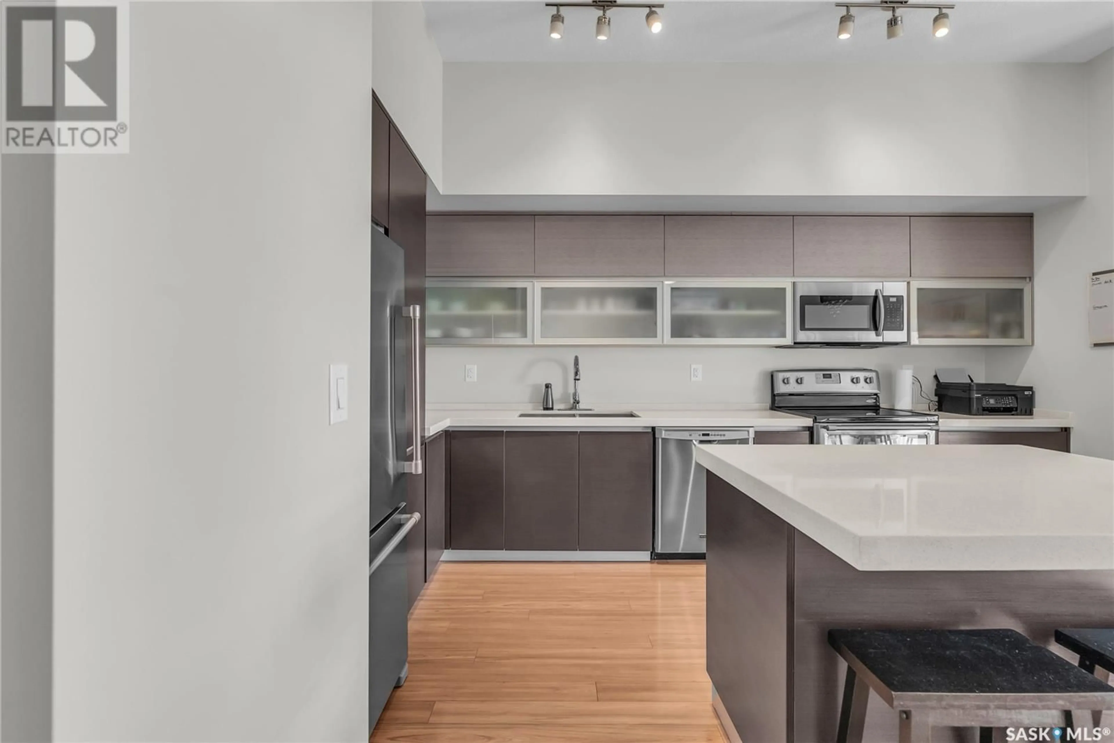 Open concept kitchen, unknown for 323 235 Evergreen SQUARE, Saskatoon Saskatchewan S7W0T9