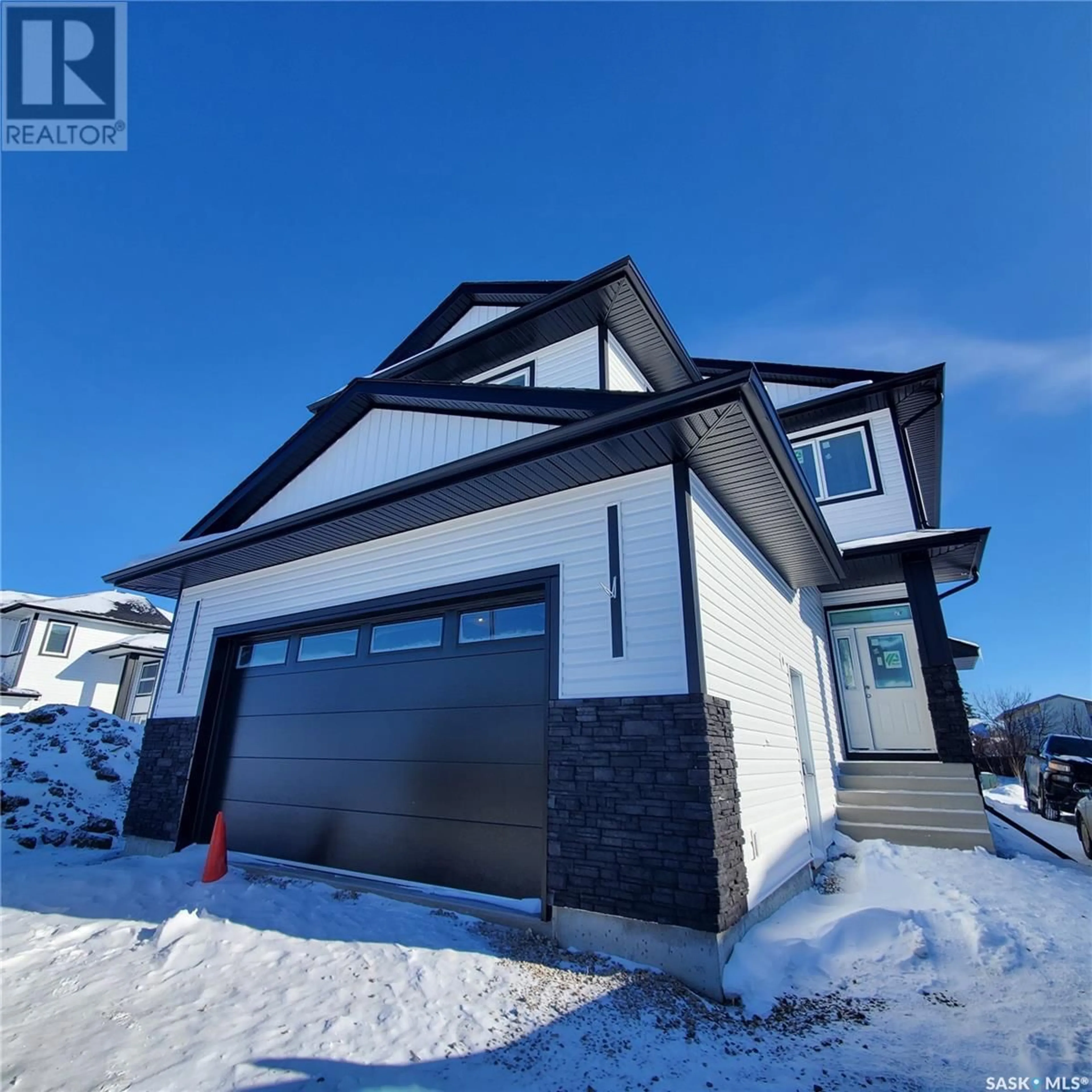 Home with vinyl exterior material, street for 503 Nightingale ROAD, Saskatoon Saskatchewan S7L6X7