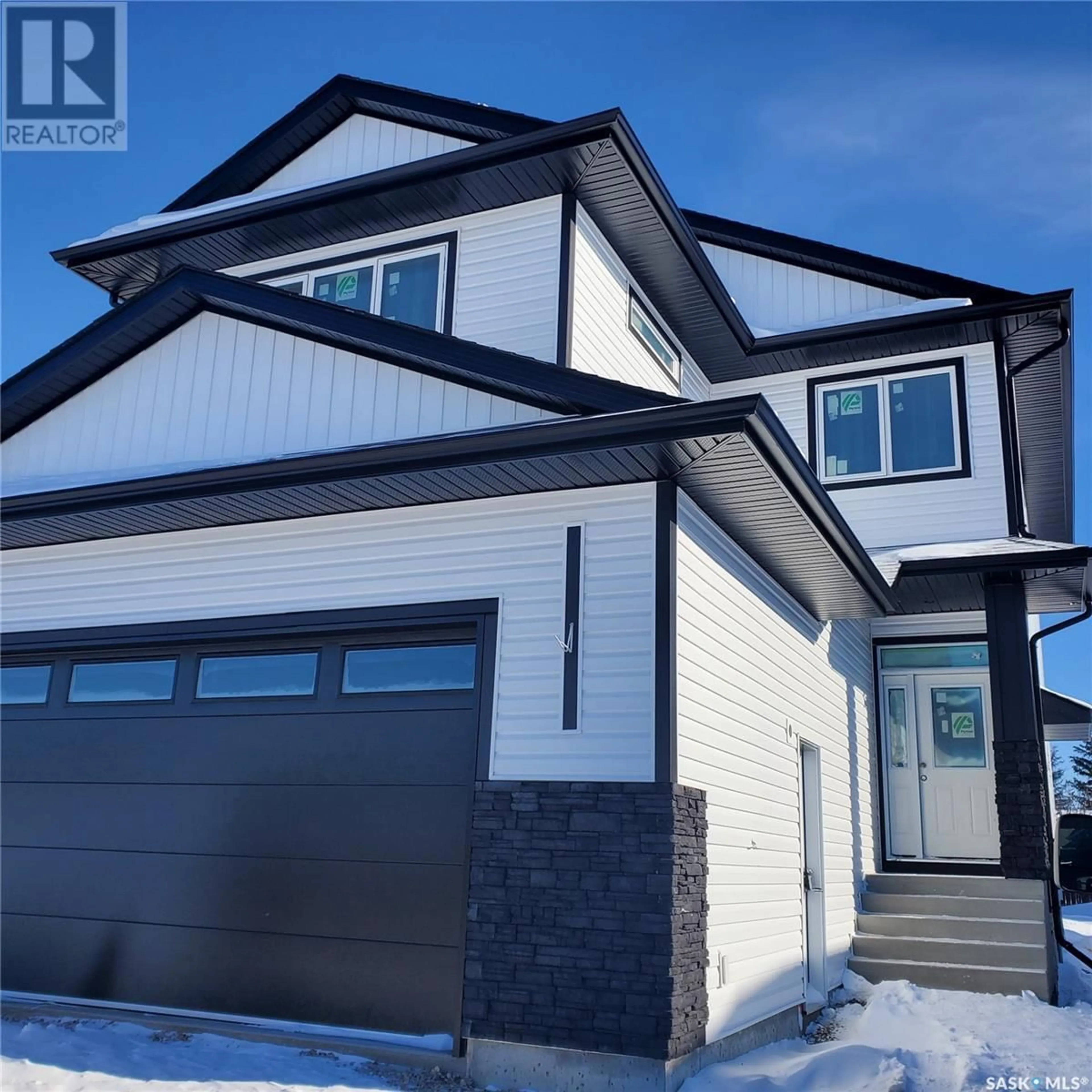 Home with vinyl exterior material, street for 503 Nightingale ROAD, Saskatoon Saskatchewan S7L6X7