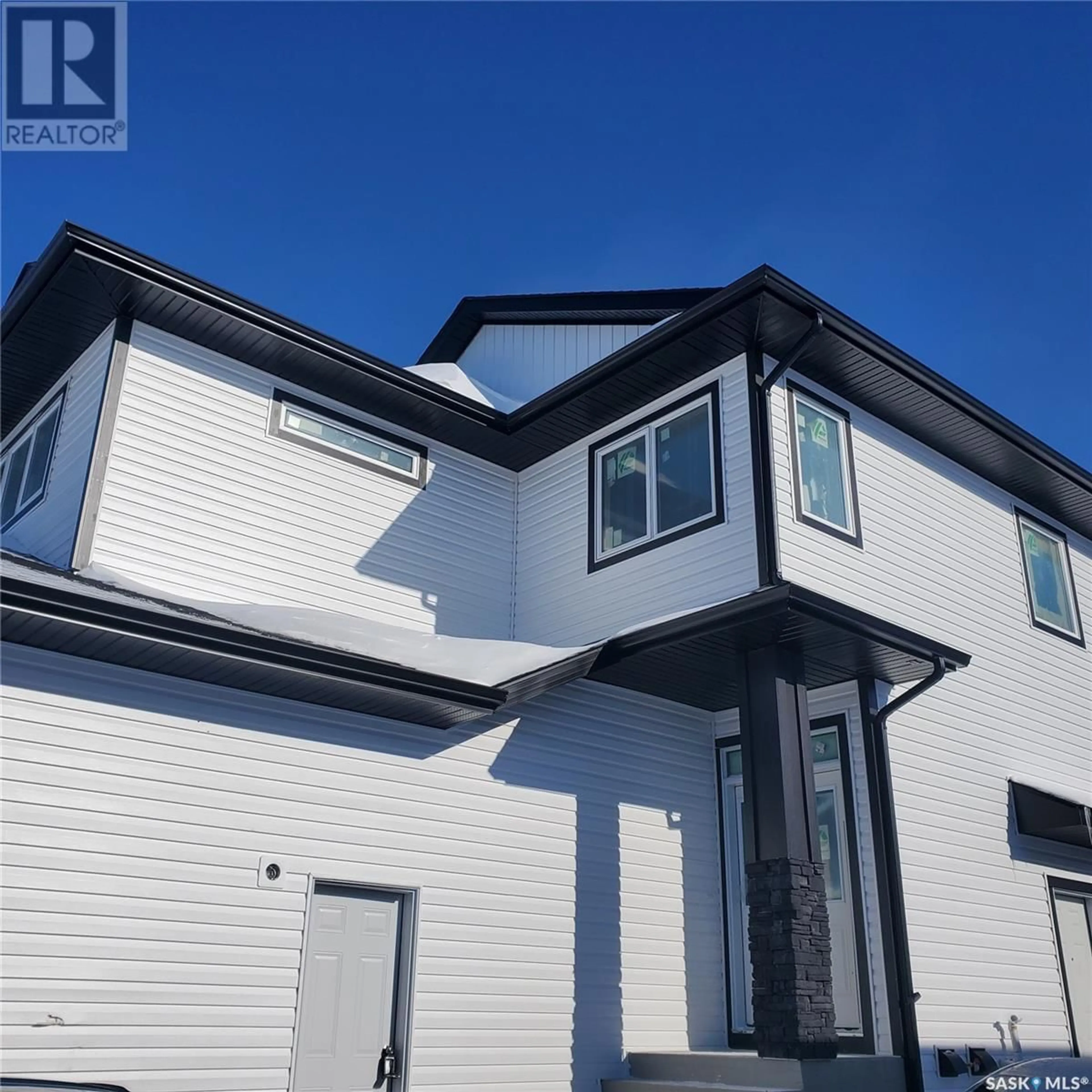 Home with vinyl exterior material, street for 503 Nightingale ROAD, Saskatoon Saskatchewan S7L6X7