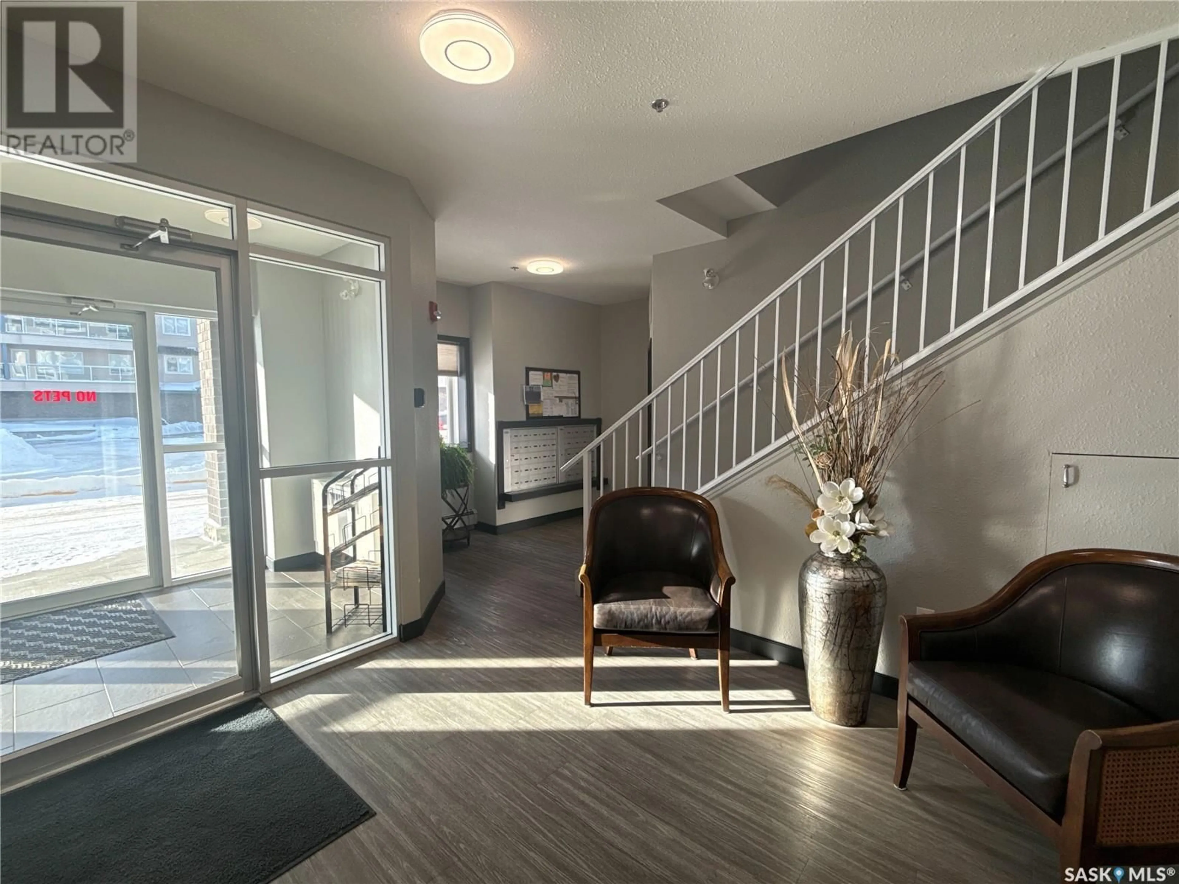 Indoor foyer for 303 2341 Windsor Park ROAD, Regina Saskatchewan S4V1R7