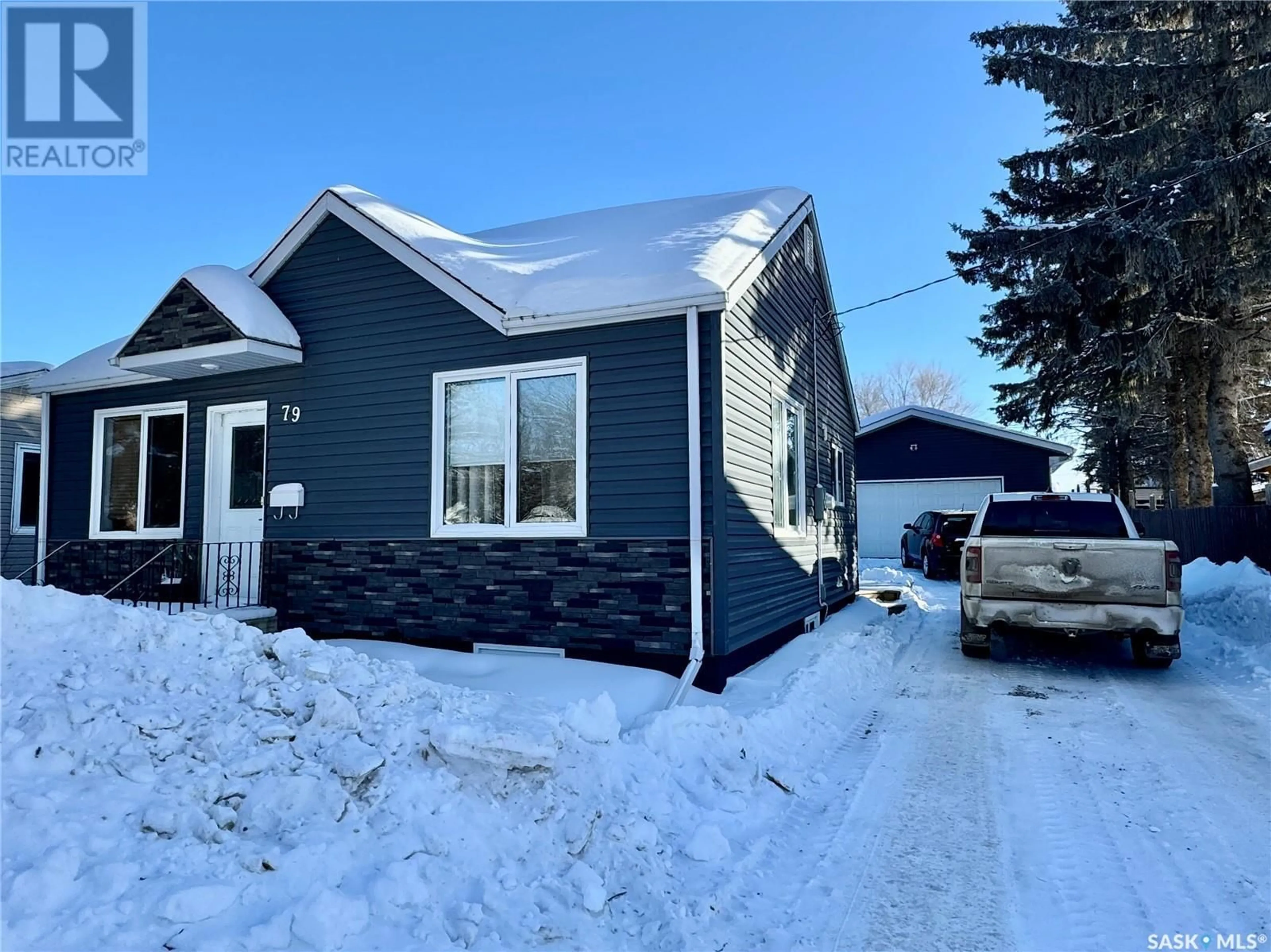 A pic from outside/outdoor area/front of a property/back of a property/a pic from drone, street for 79 Maple AVENUE, Yorkton Saskatchewan S3N1V8