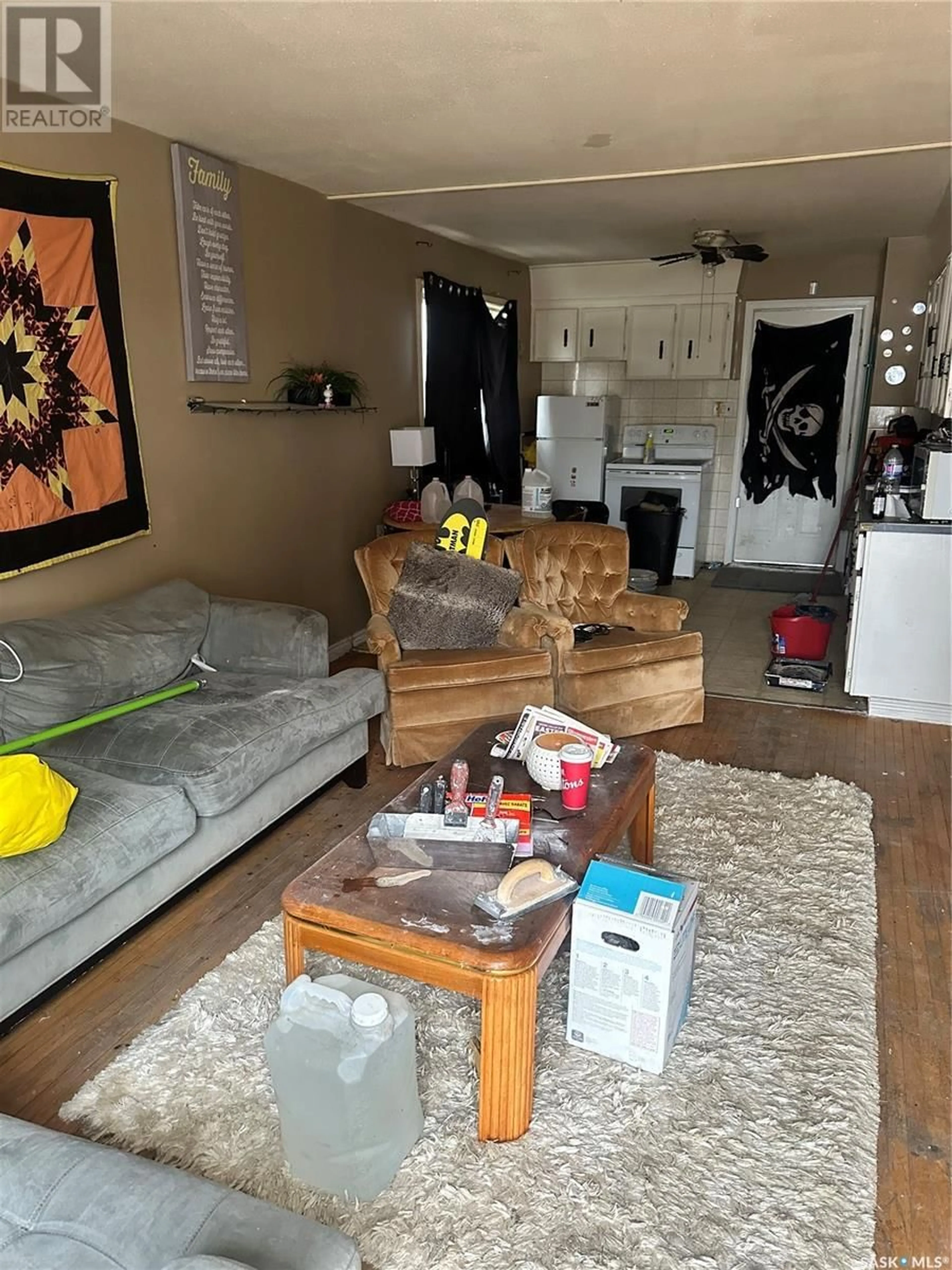Living room with furniture, wood/laminate floor for 626 MCTAVISH STREET, Regina Saskatchewan S4T3T5