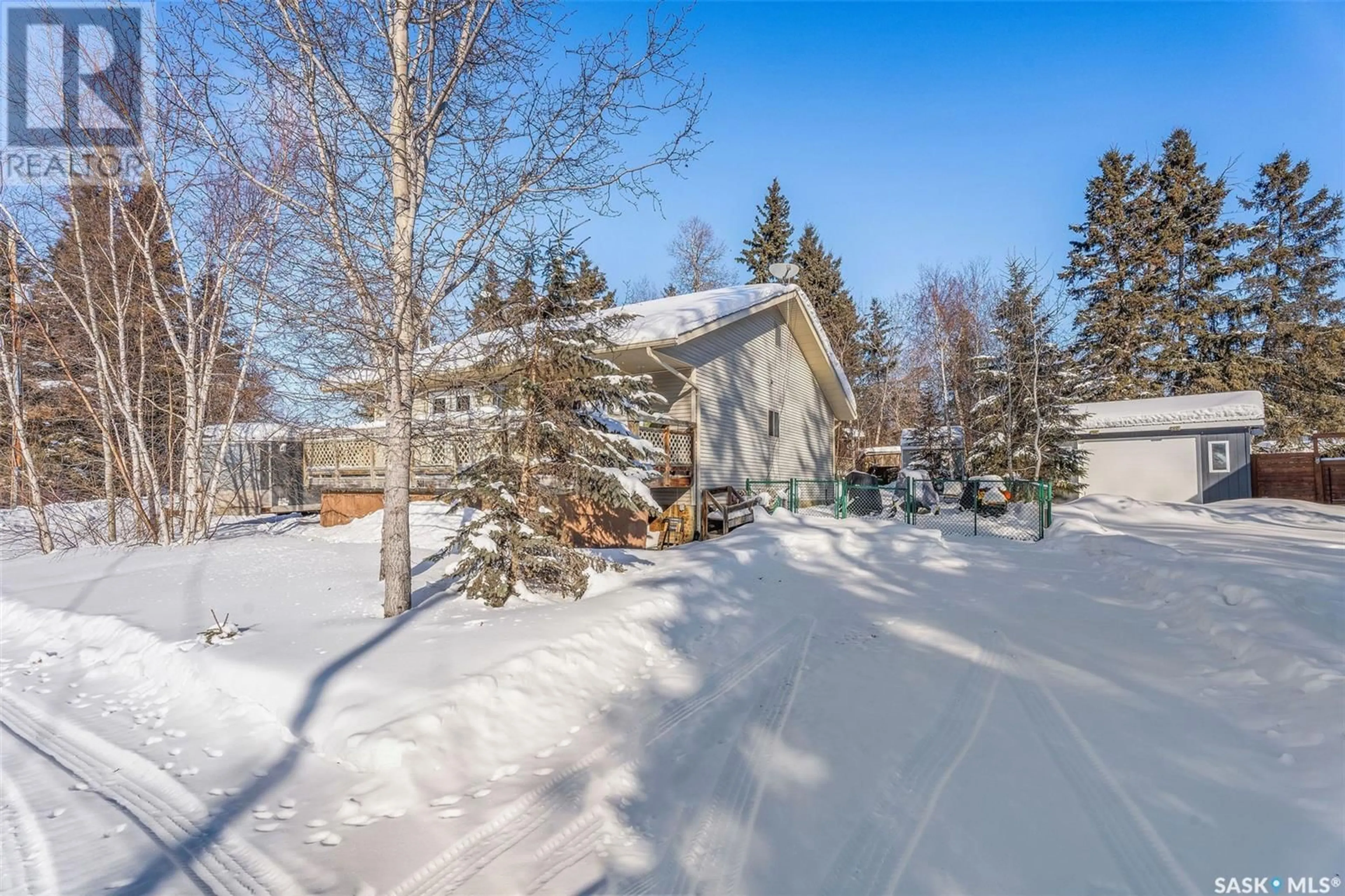 A pic from outside/outdoor area/front of a property/back of a property/a pic from drone, street for 301 Jacobson DRIVE, Christopher Lake Saskatchewan S0J0N0