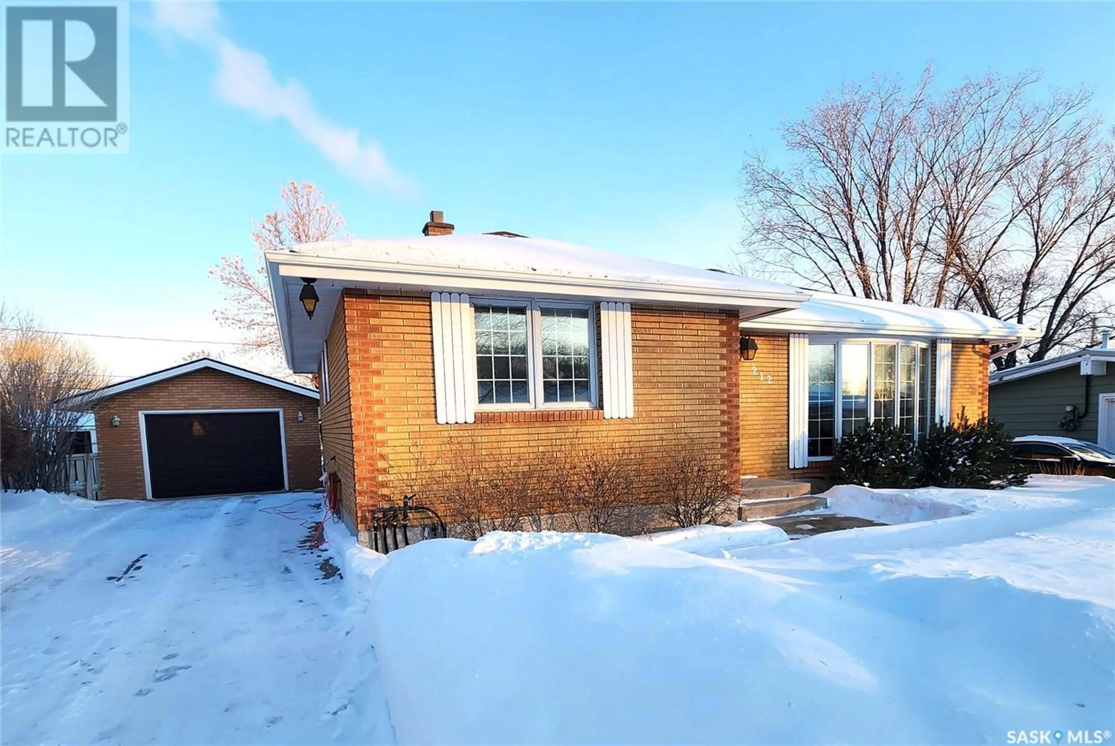 Home with brick exterior material, street for 212 Duncan ROAD, Estevan Saskatchewan S4A0A2