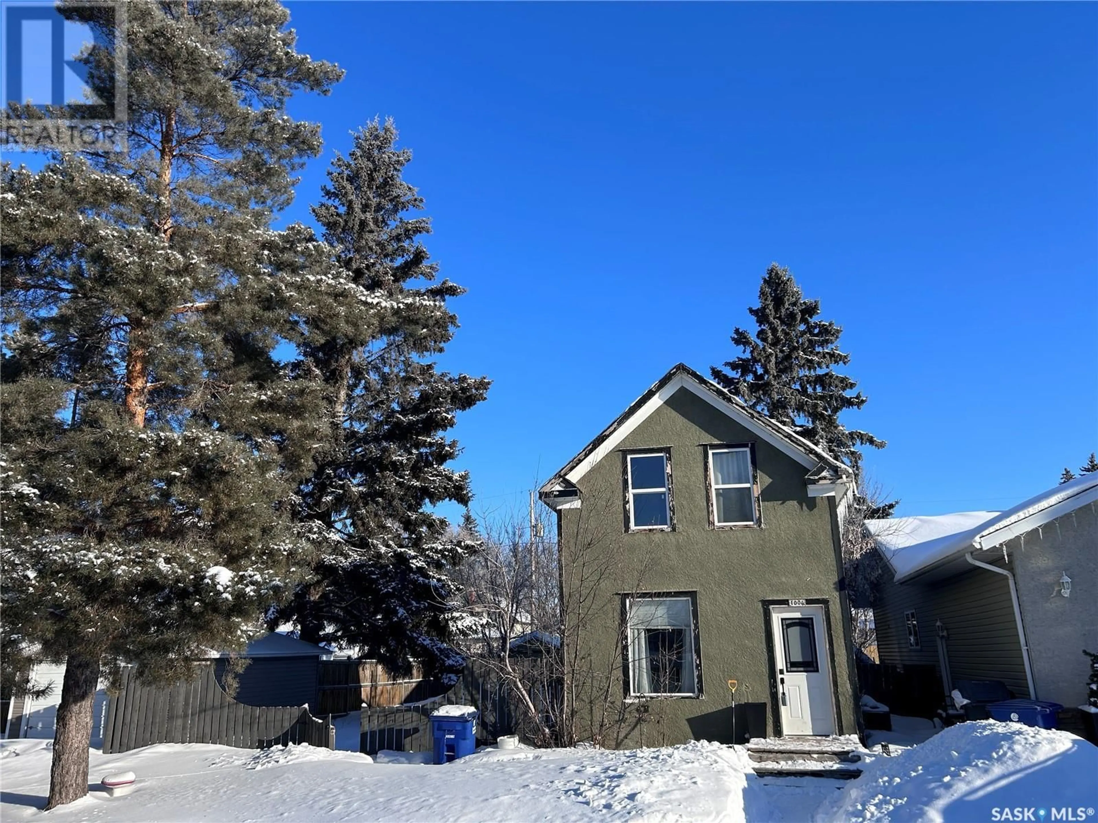 A pic from outside/outdoor area/front of a property/back of a property/a pic from drone, street for 1006 9th STREET, Rosthern Saskatchewan S0K3R0