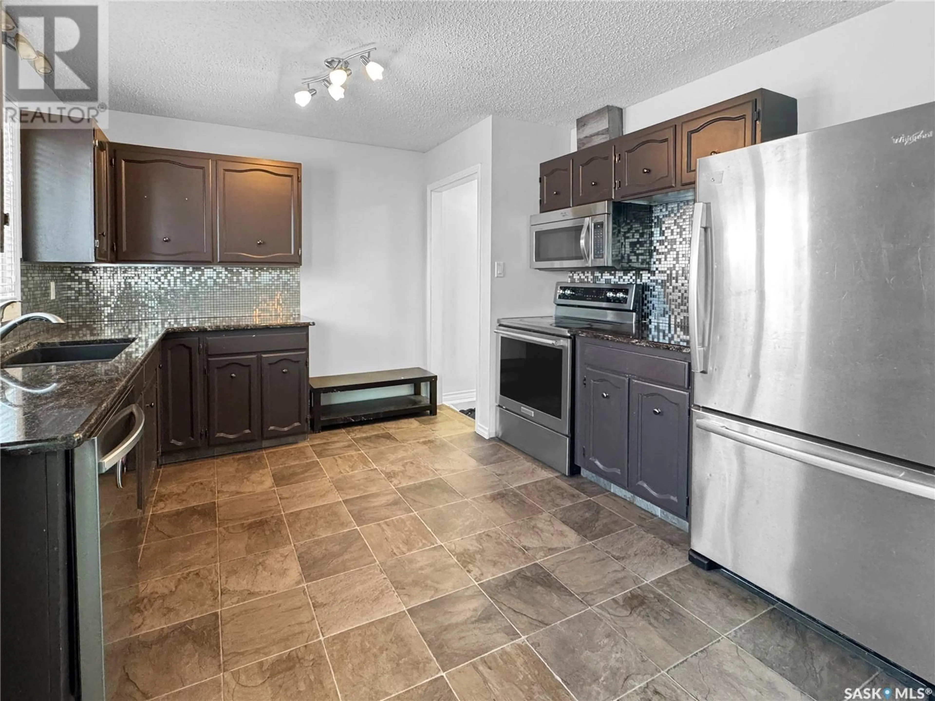 Standard kitchen, ceramic/tile floor for 8908 Abbott AVENUE, North Battleford Saskatchewan S9A3H6