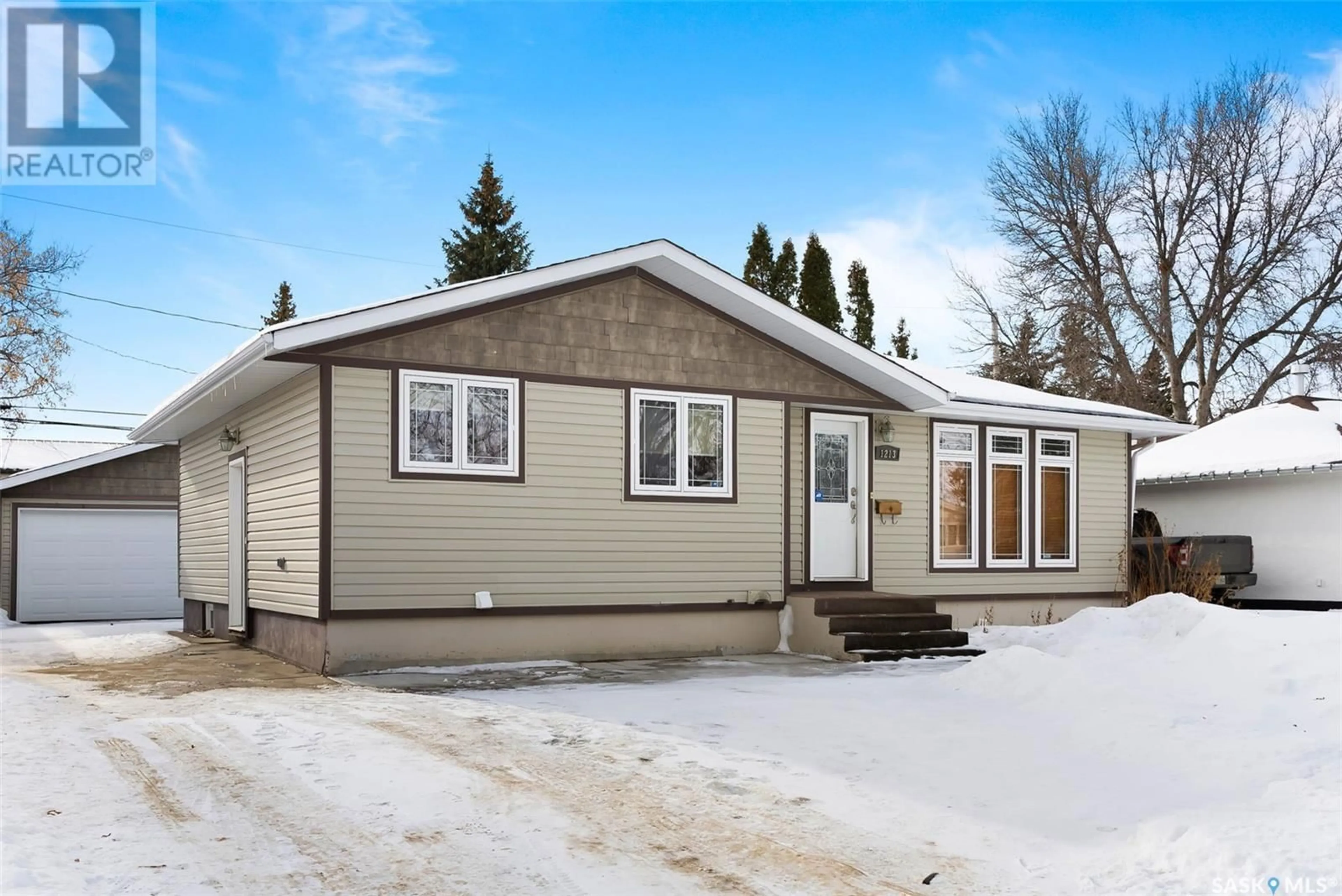 Home with vinyl exterior material, street for 1213 Carleton STREET, Moose Jaw Saskatchewan S6H3A5