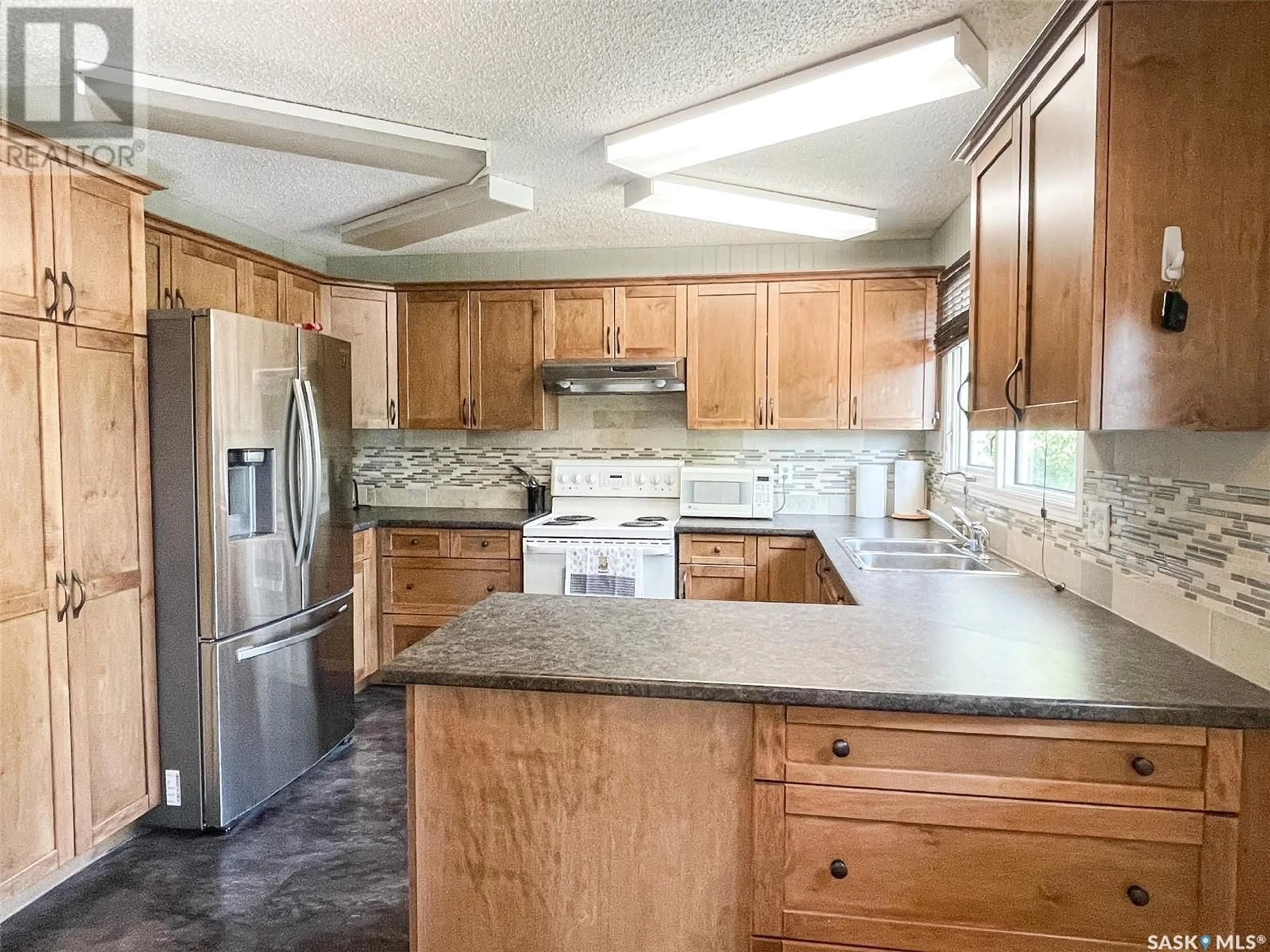 Standard kitchen, ceramic/tile floor for 508 COCHIN AVENUE, Meadow Lake Saskatchewan S9X1B9