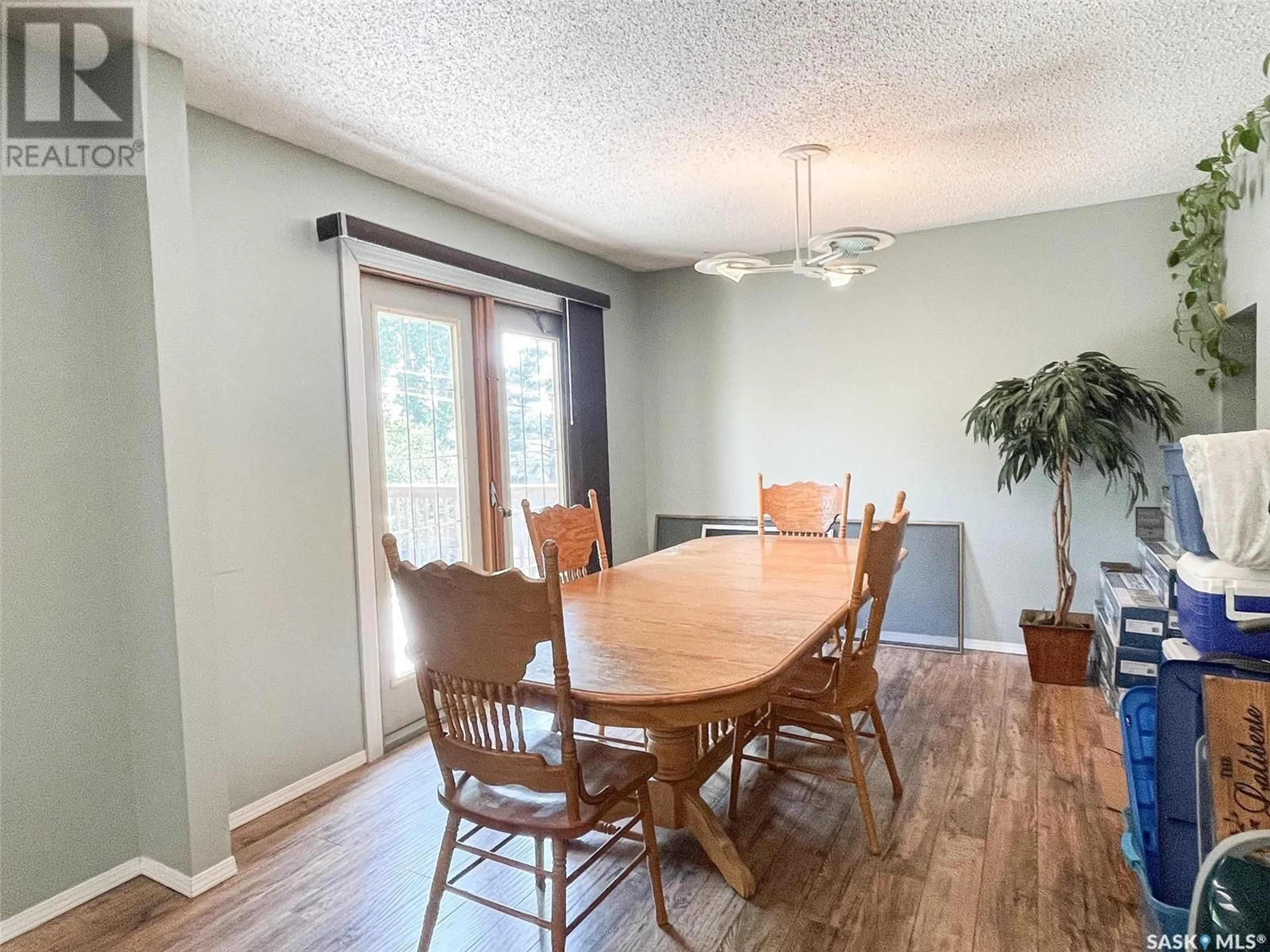 Dining room, wood/laminate floor for 508 COCHIN AVENUE, Meadow Lake Saskatchewan S9X1B9