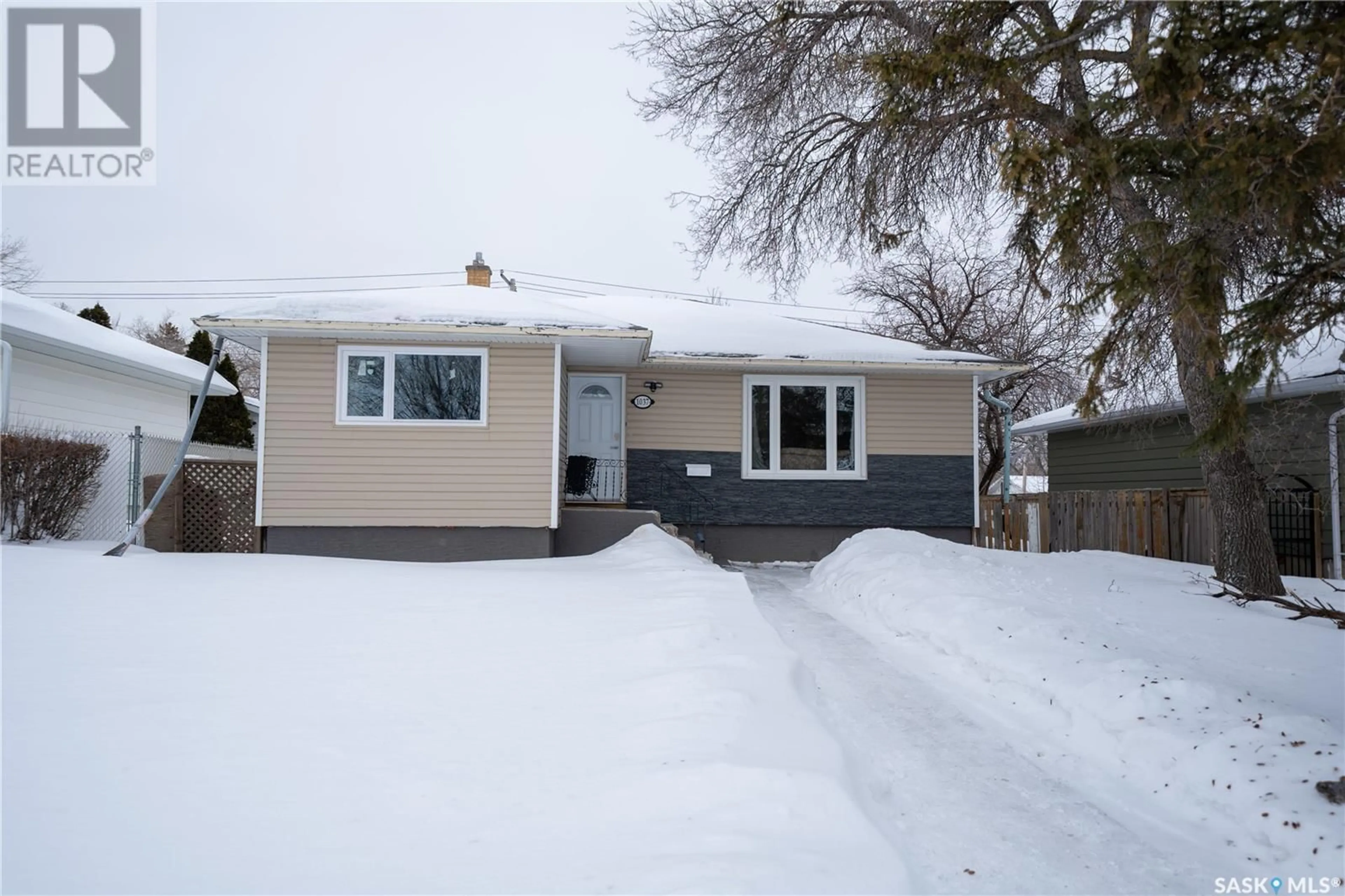 Home with vinyl exterior material, street for 1037 Campbell STREET, Regina Saskatchewan S4T5P5