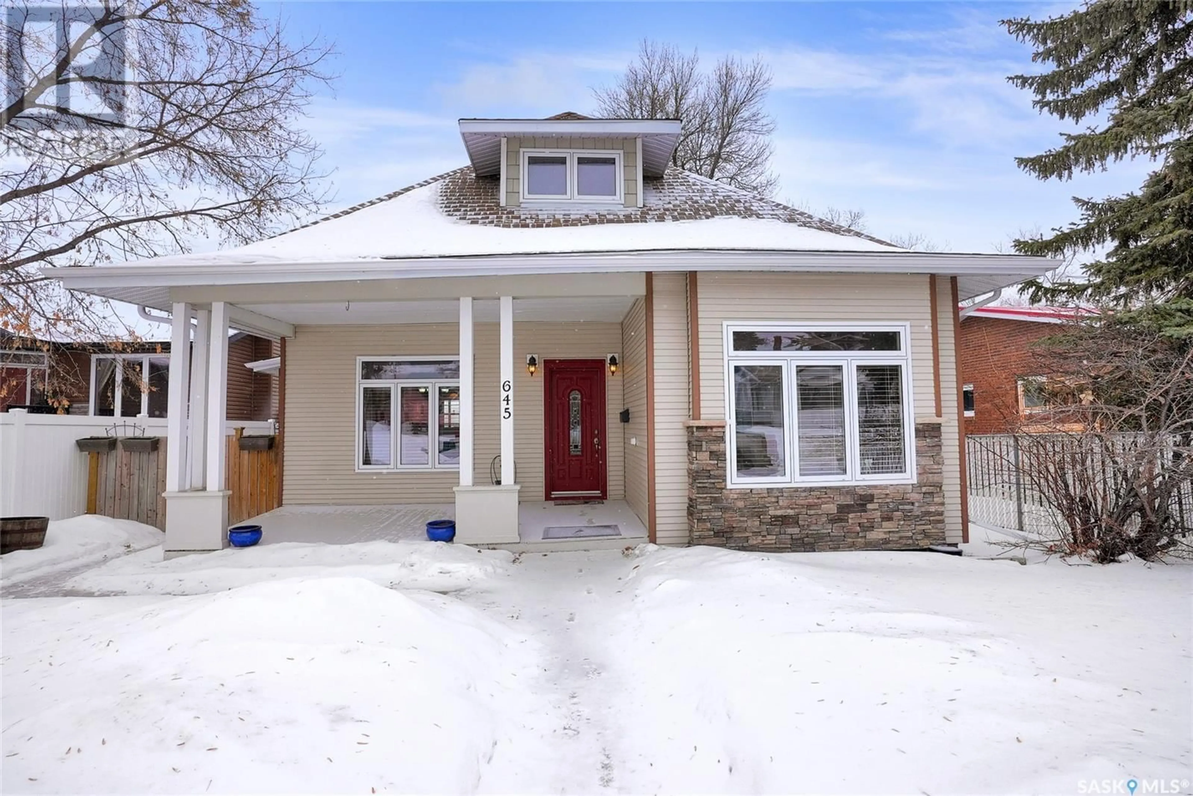 Home with brick exterior material, street for 645 Hochelaga STREET W, Moose Jaw Saskatchewan S6H2H3