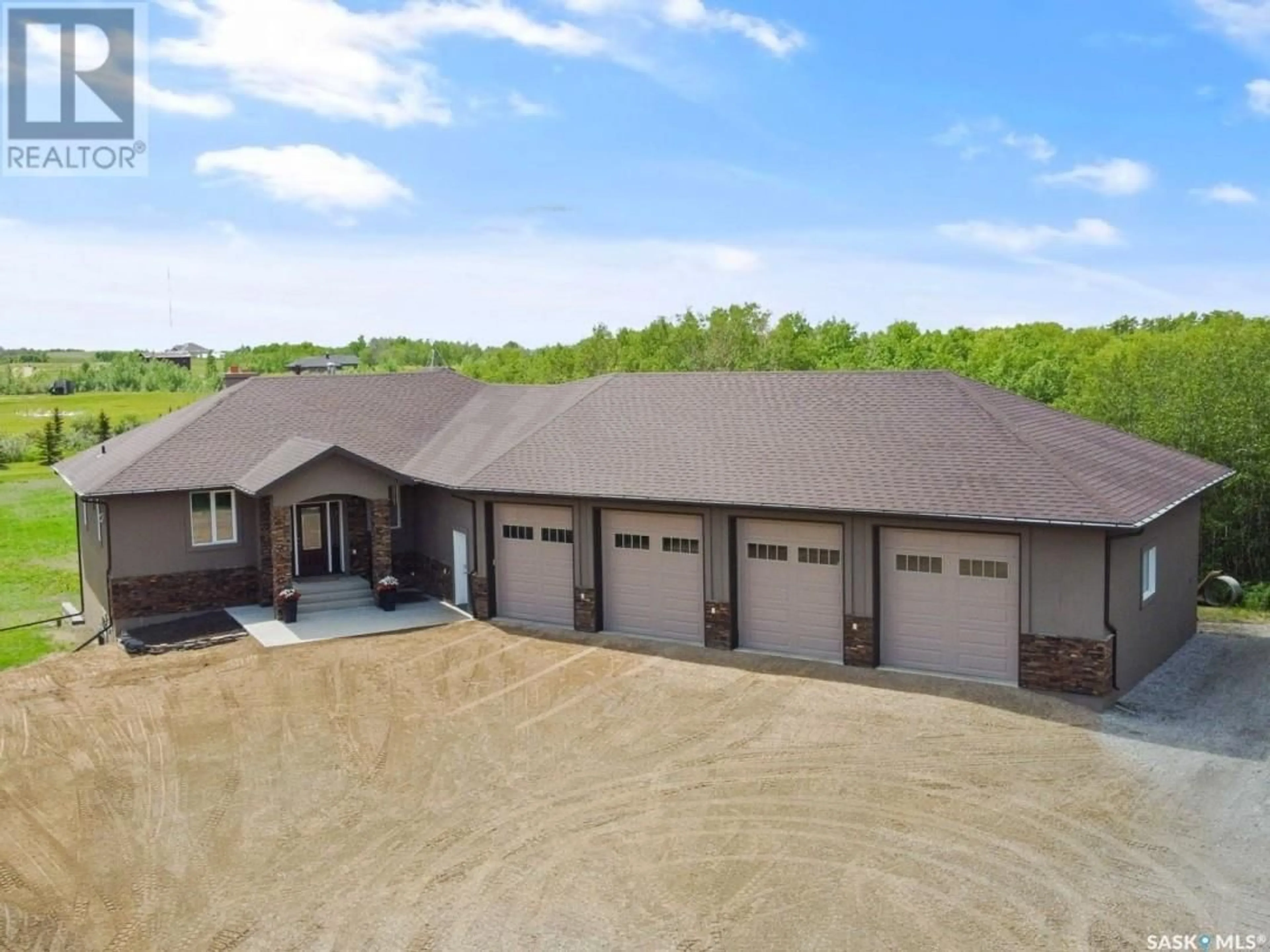 A pic from outside/outdoor area/front of a property/back of a property/a pic from drone, building for 115 MISSION RIDGE ROAD, Aberdeen Rm No. 373 Saskatchewan S7J0A5