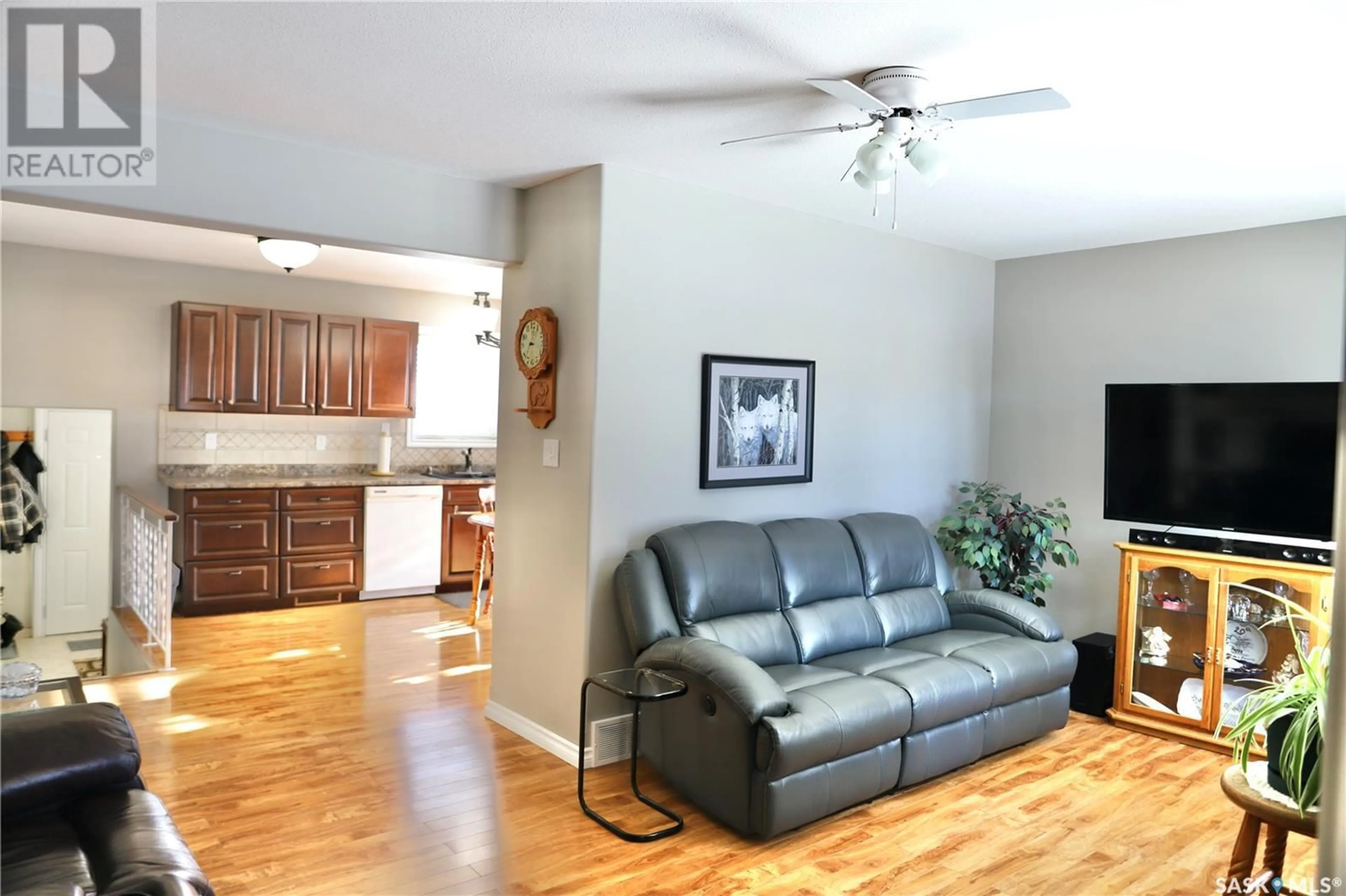 Living room with furniture, wood/laminate floor for 222 Sanjun DRIVE, Shellbrook Saskatchewan S0J2E0