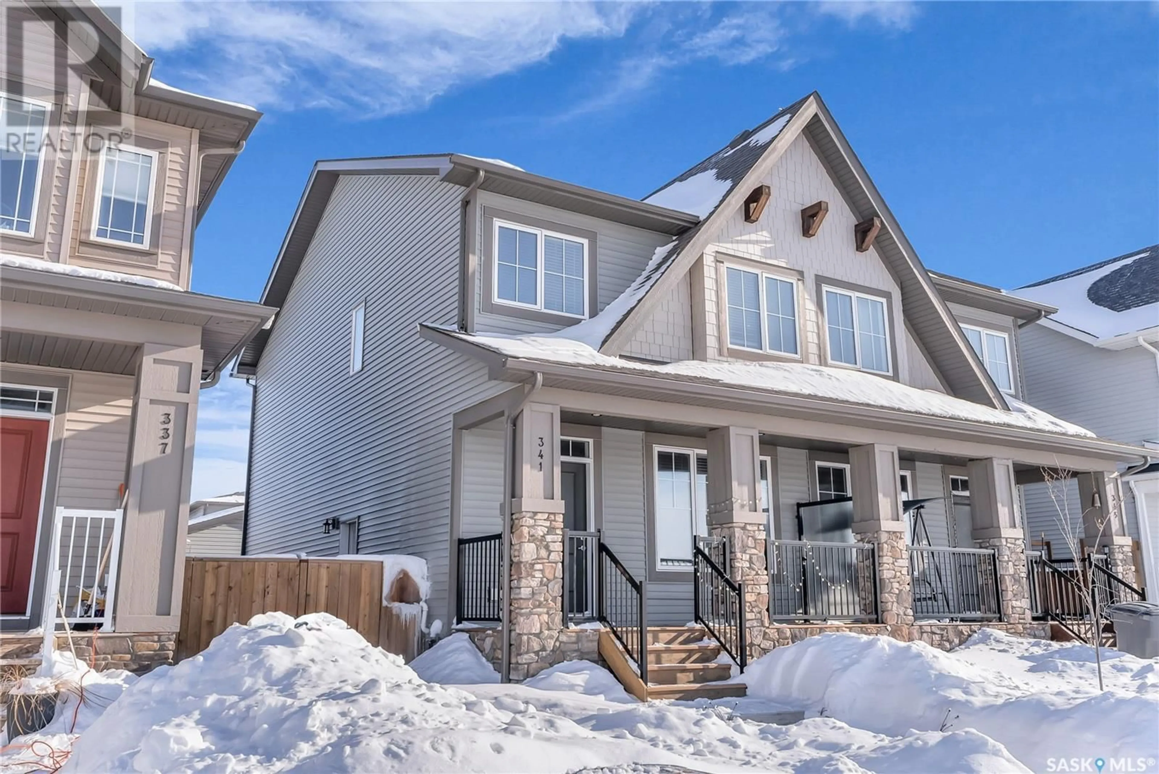 Home with brick exterior material, street for 341 Brighton BOULEVARD, Saskatoon Saskatchewan S7V0R5