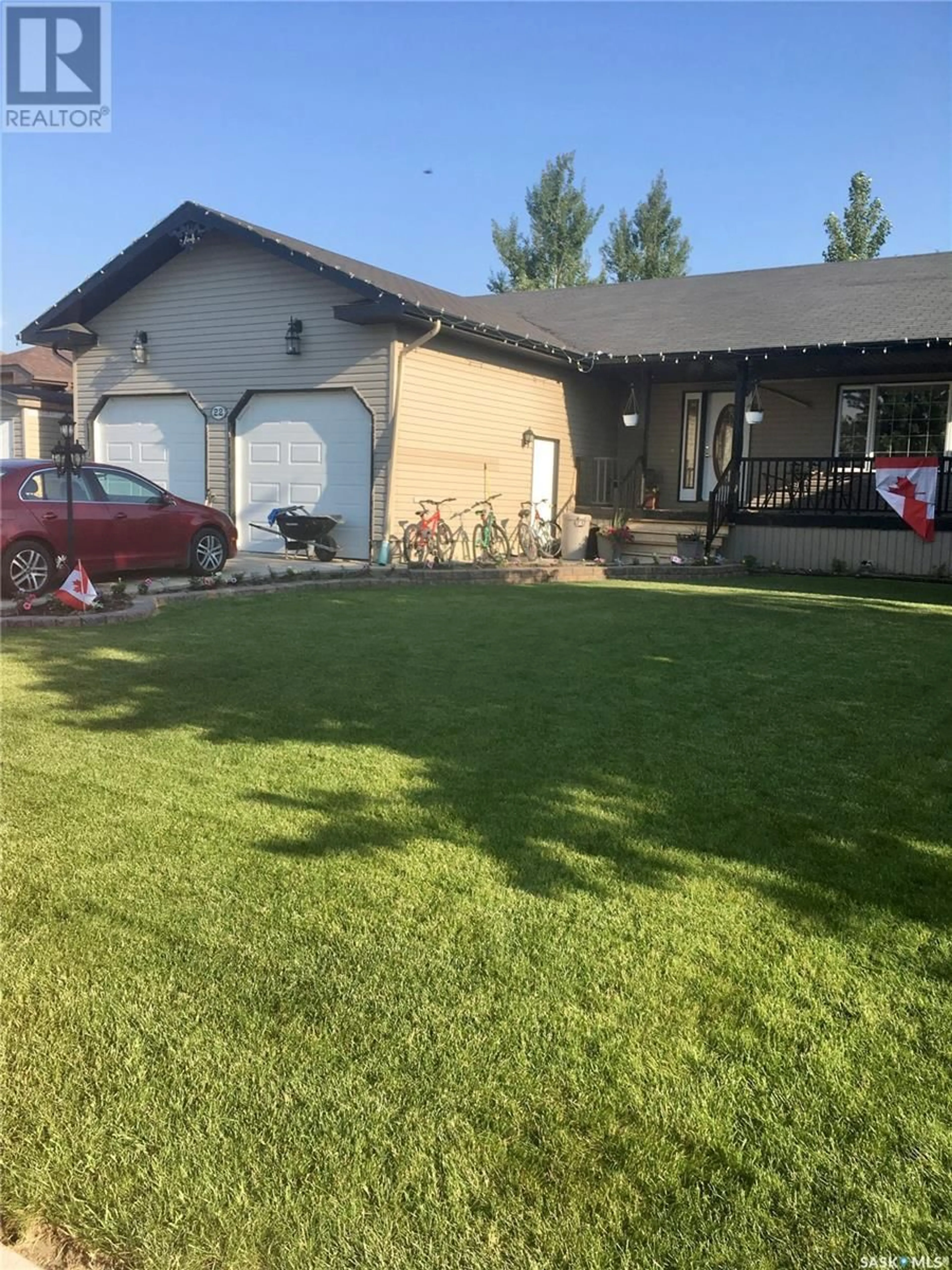 A pic from outside/outdoor area/front of a property/back of a property/a pic from drone, street for 22 Reid CRESCENT, Outlook Saskatchewan S0L2N0