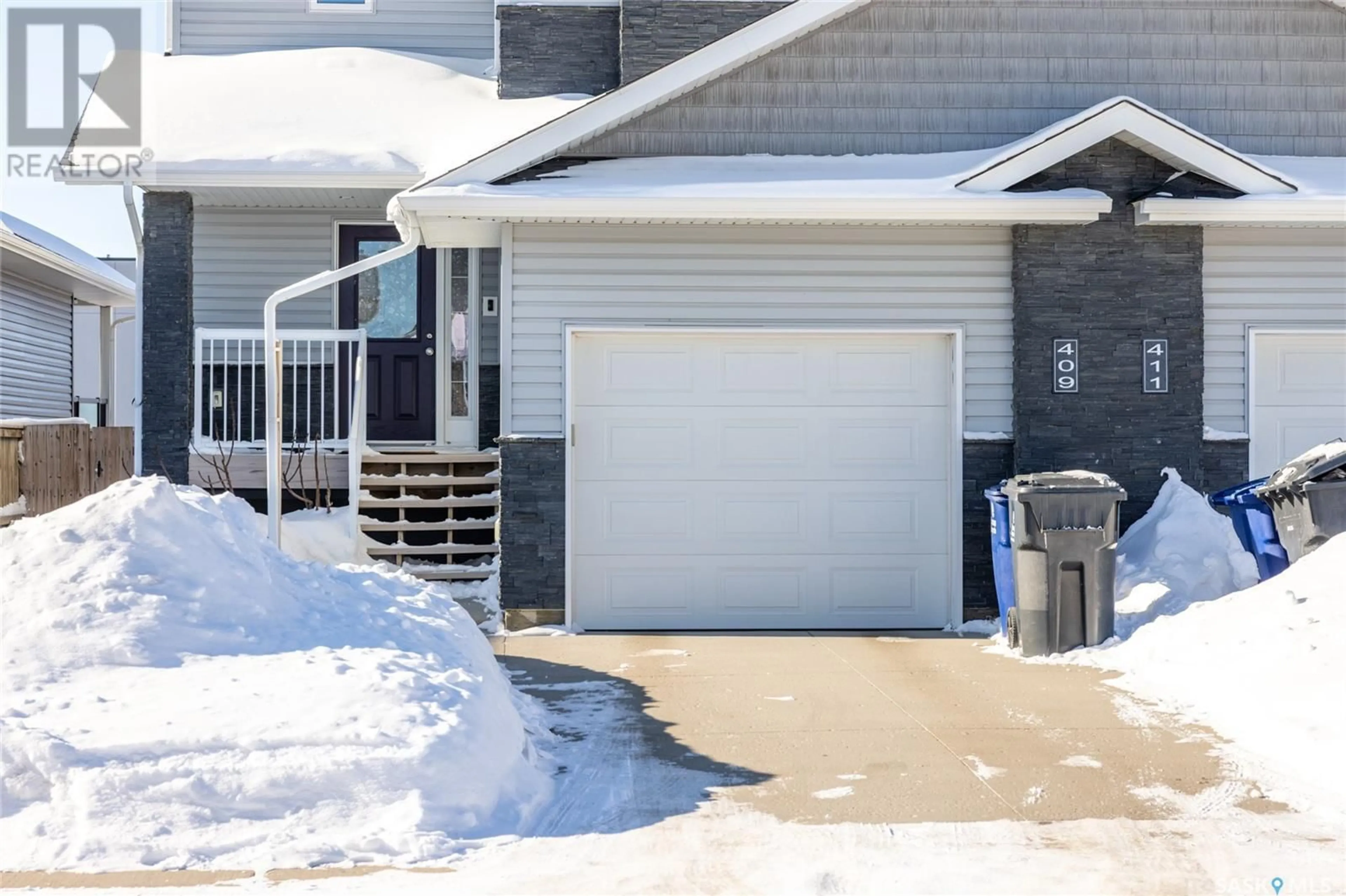 Indoor garage for 409 Langer PLACE, Warman Saskatchewan S0K4S1