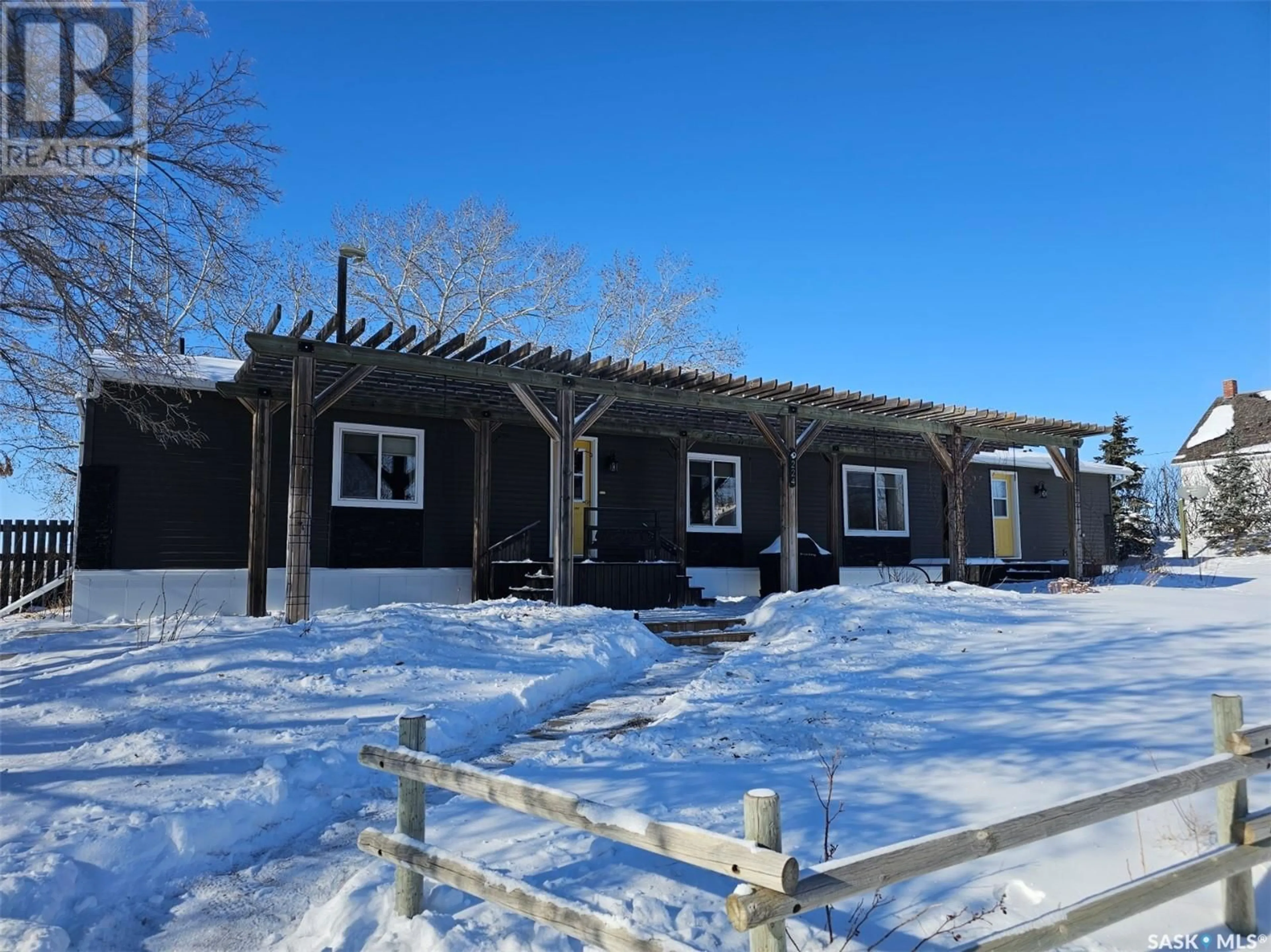 Home with vinyl exterior material, street for 224 CENTER STREET, Mankota Rm No. 45 Saskatchewan S0H2T0