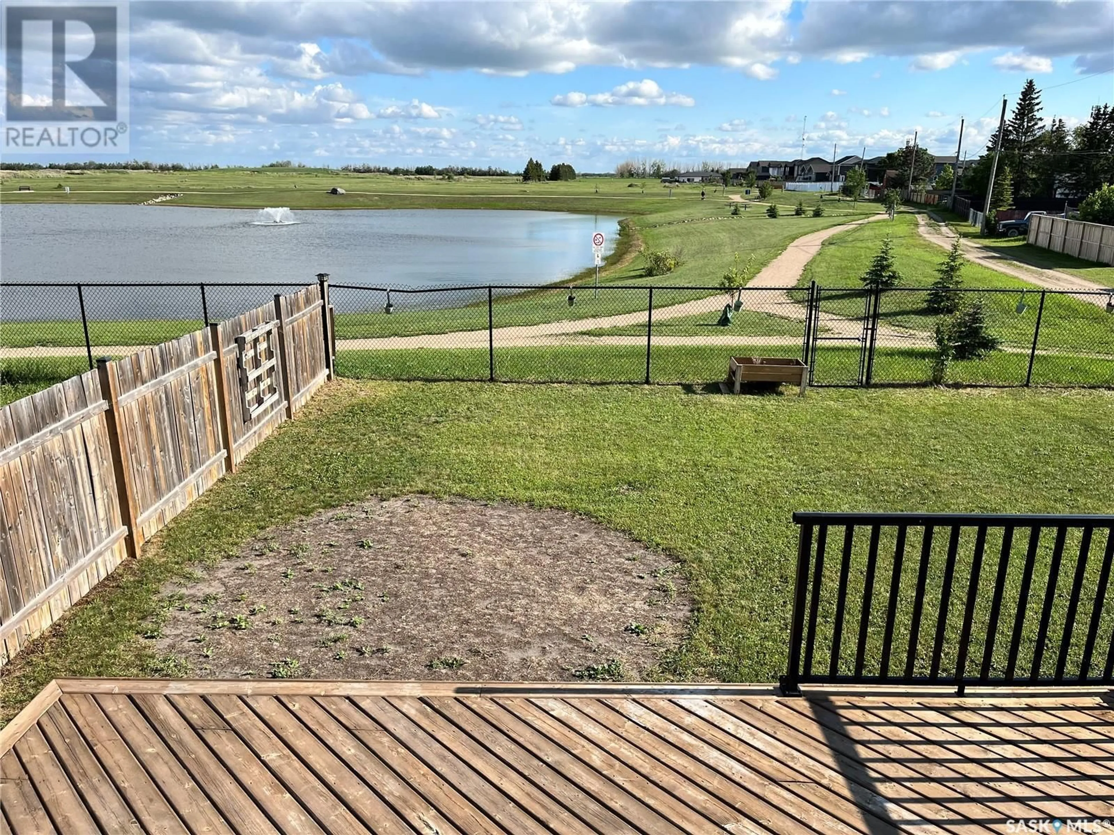 A pic from outside/outdoor area/front of a property/back of a property/a pic from drone, water/lake/river/ocean view for 401 Loeppky AVENUE, Dalmeny Saskatchewan S0K1E0