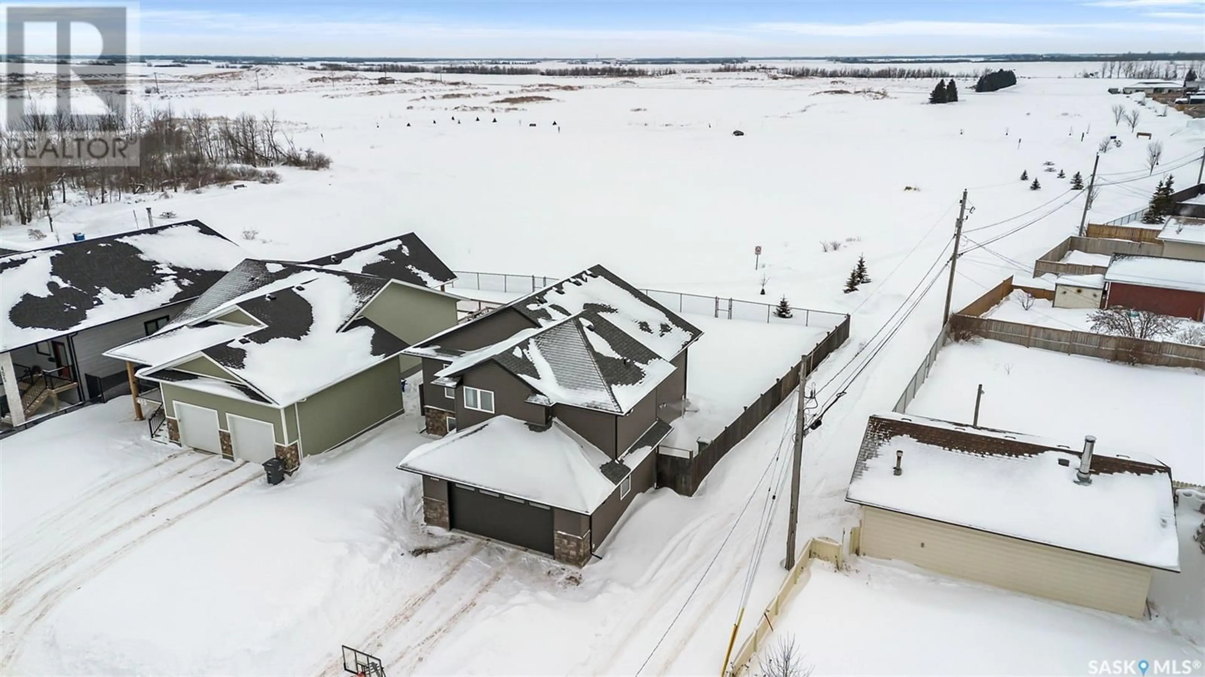 A pic from outside/outdoor area/front of a property/back of a property/a pic from drone, unknown for 401 Loeppky AVENUE, Dalmeny Saskatchewan S0K1E0