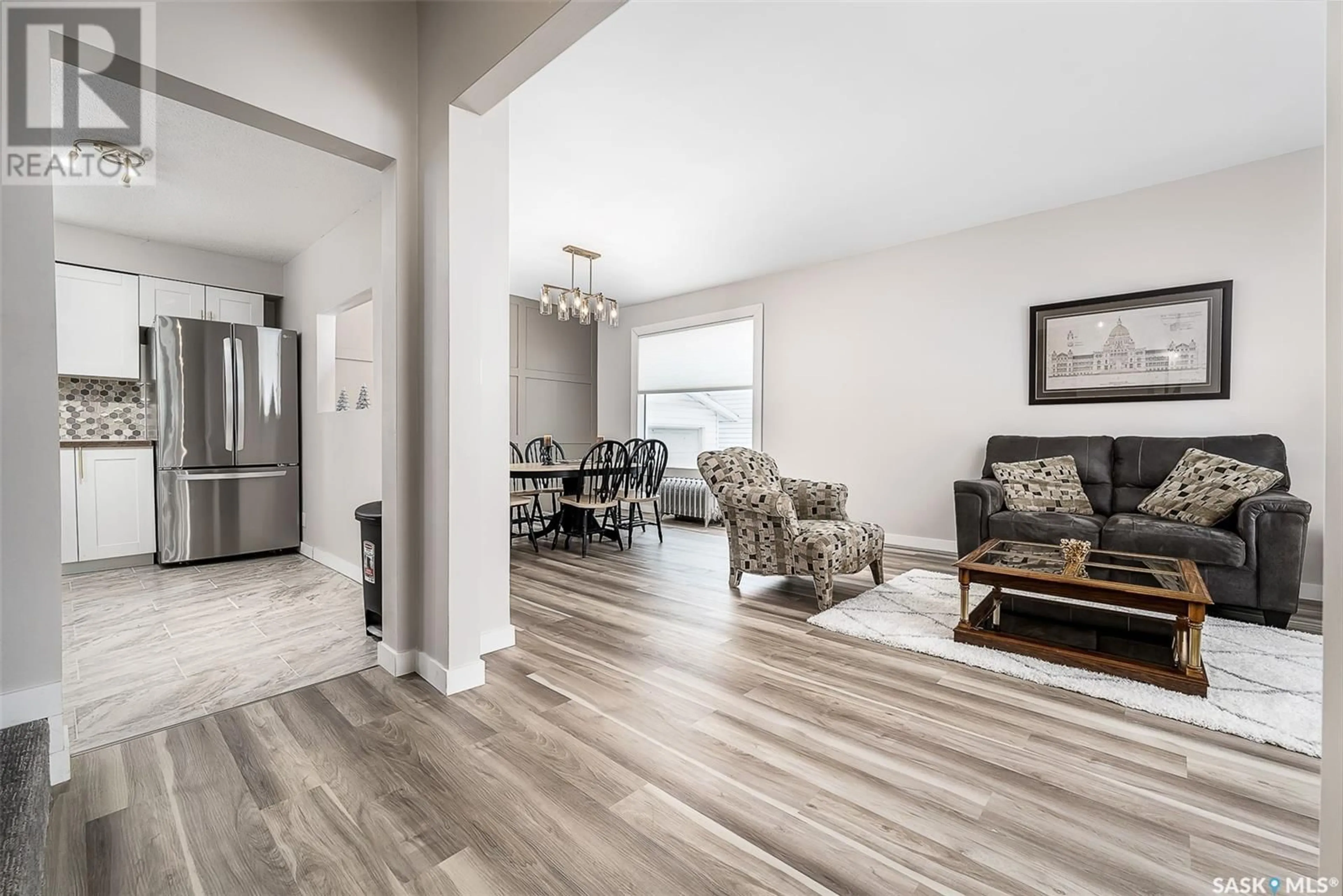 Living room with furniture, wood/laminate floor for 1215 Grafton AVENUE, Moose Jaw Saskatchewan S6H3S7