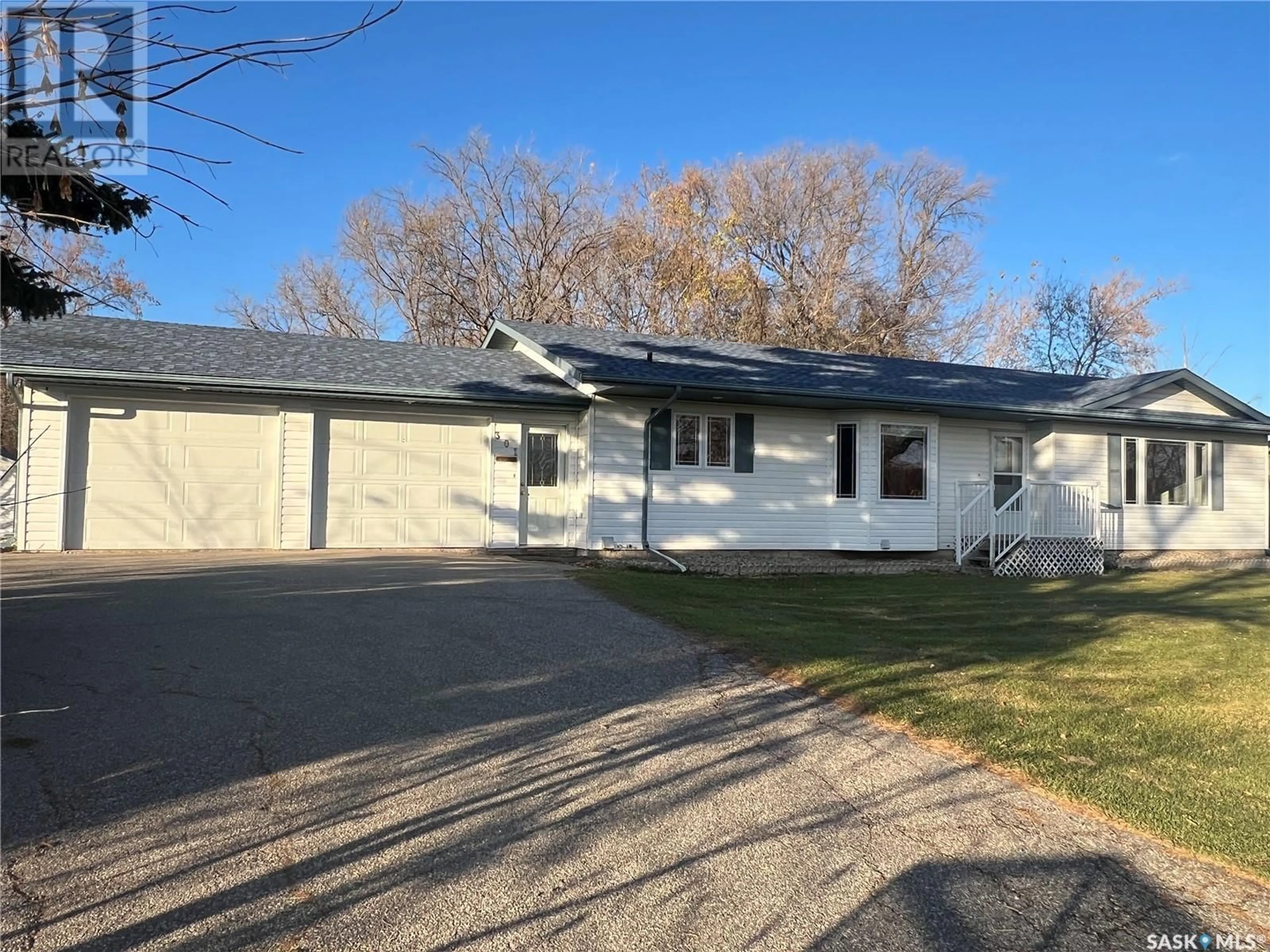 Home with vinyl exterior material, street for 301 ALBERTA AVENUE, Stockholm Saskatchewan S0A3Y0