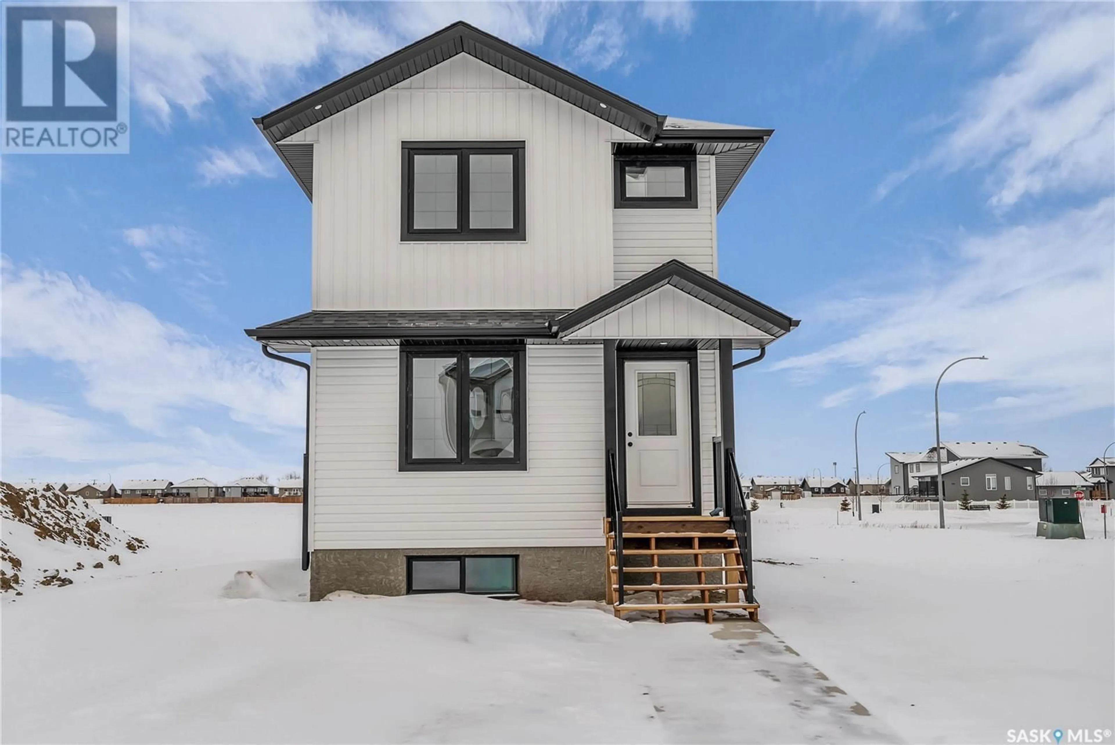 Home with vinyl exterior material, street for 402 Eldorado STREET, Warman Saskatchewan S0K4S0