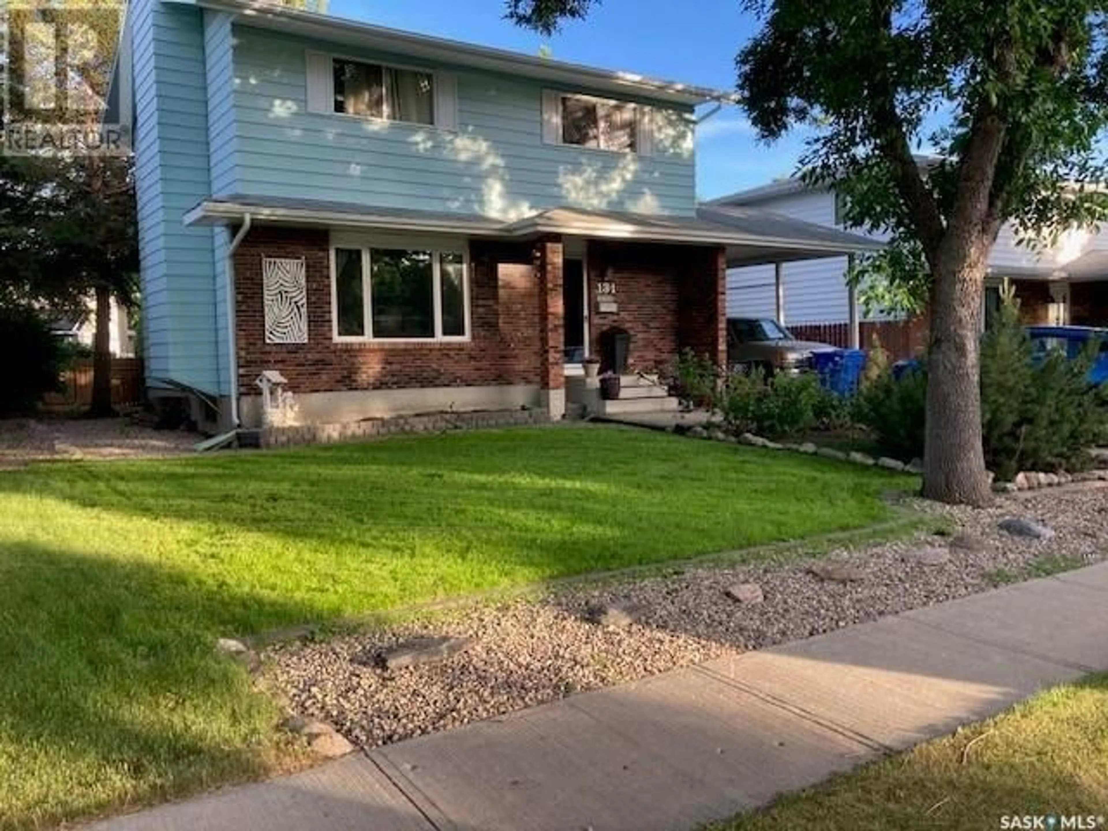 Home with vinyl exterior material, street for 131 Nollet AVENUE, Regina Saskatchewan S4T7P2