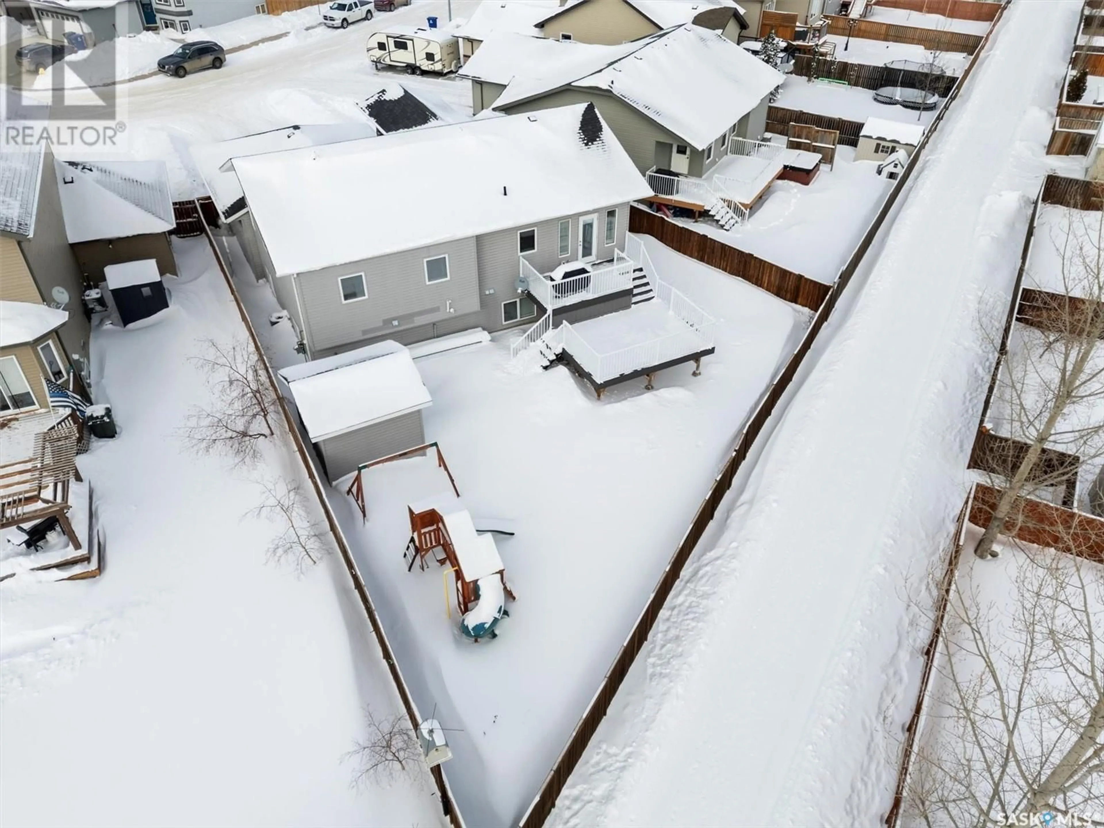 A pic from outside/outdoor area/front of a property/back of a property/a pic from drone, street for 406 Quessy DRIVE, Martensville Saskatchewan S0K0A2