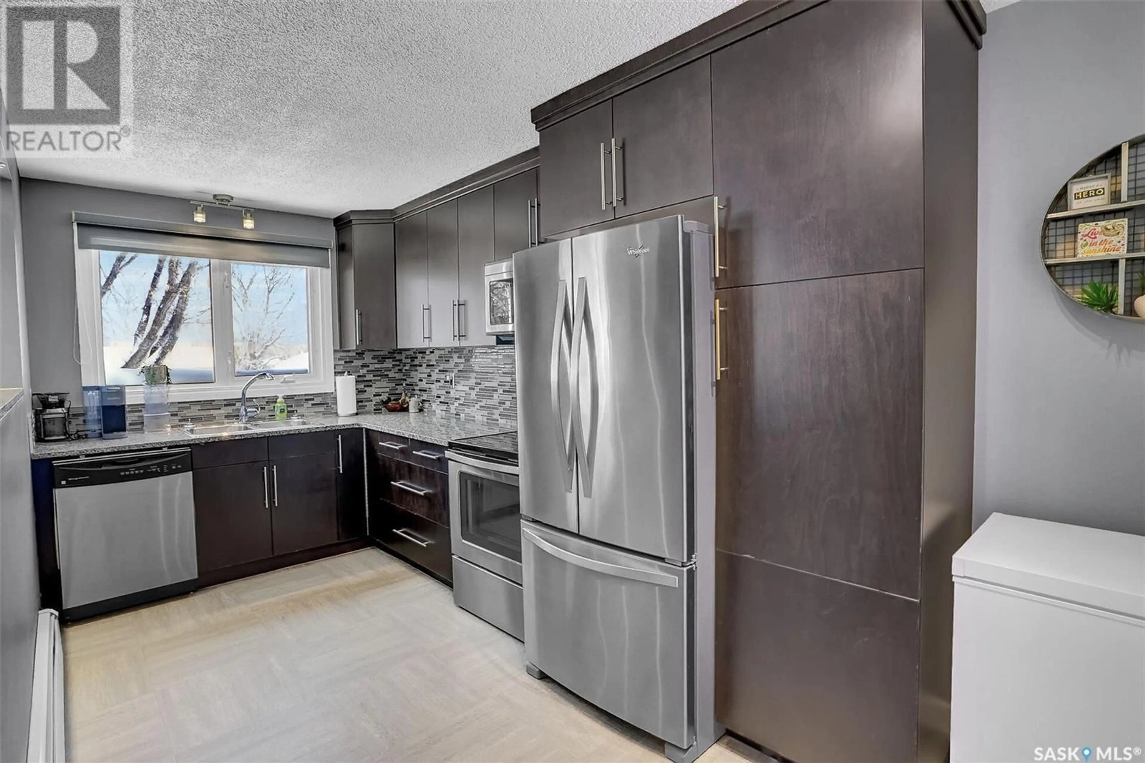 Contemporary kitchen, ceramic/tile floor for 10 38 SPENCE STREET, Regina Saskatchewan S4S4H4