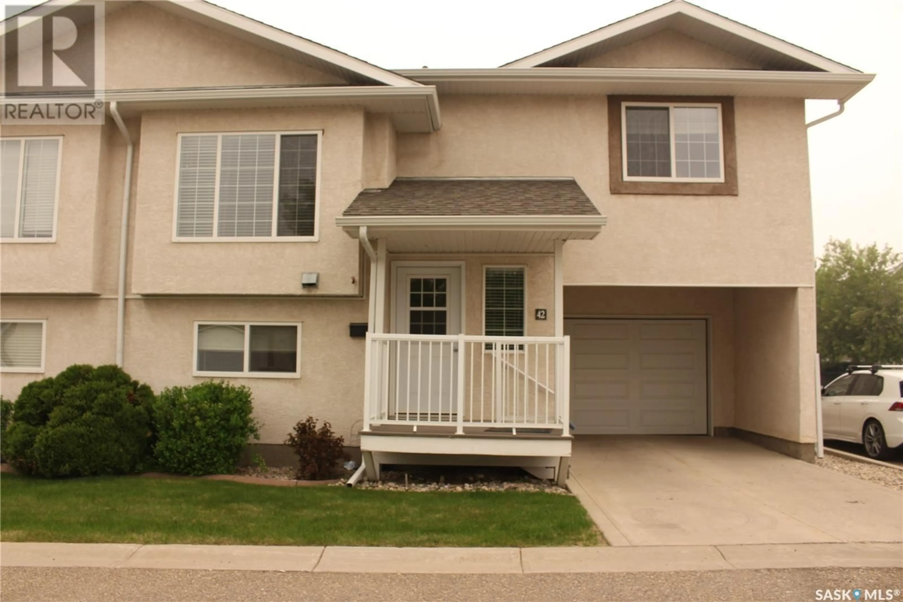 Home with vinyl exterior material, street for 42 - 4425 NICURITY DRIVE, Regina Saskatchewan S4X0E6