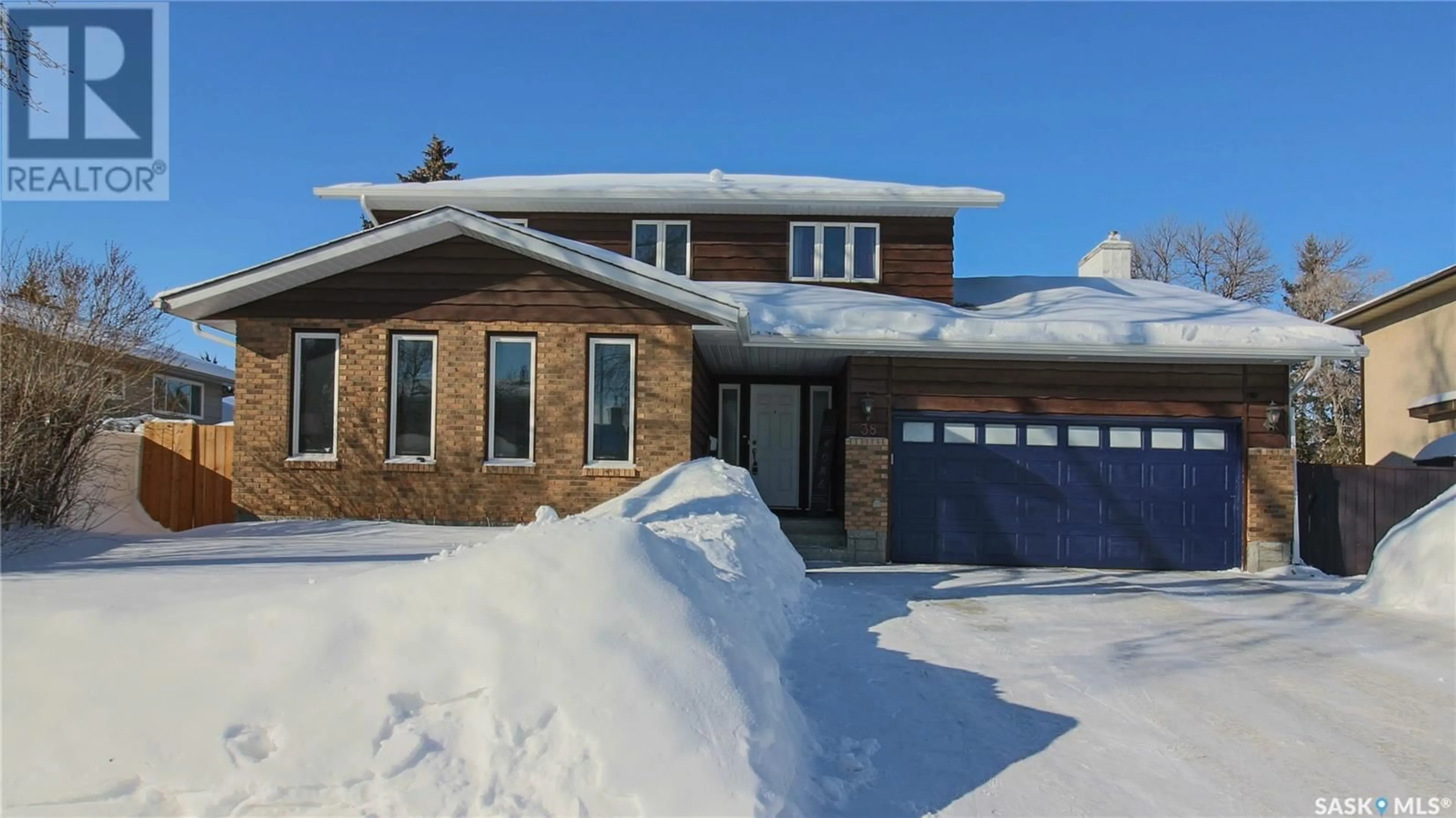 Home with brick exterior material, street for 38 UNIVERSITY PARK DRIVE, Regina Saskatchewan S4V0E2