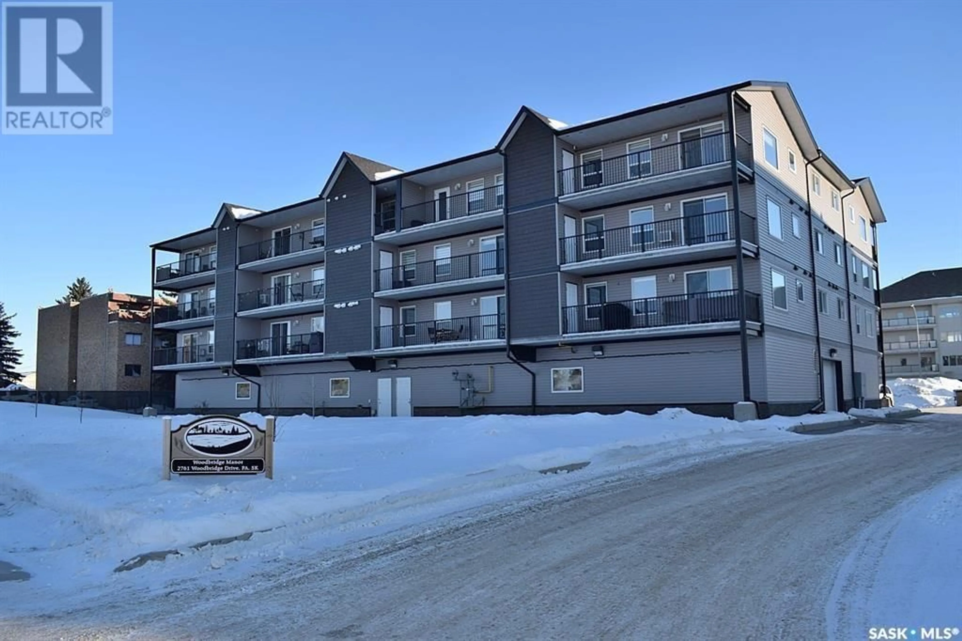 A pic from outside/outdoor area/front of a property/back of a property/a pic from drone, building for 201 - 2761 WOODBRIDGE DRIVE, Prince Albert Saskatchewan S6V3Z9