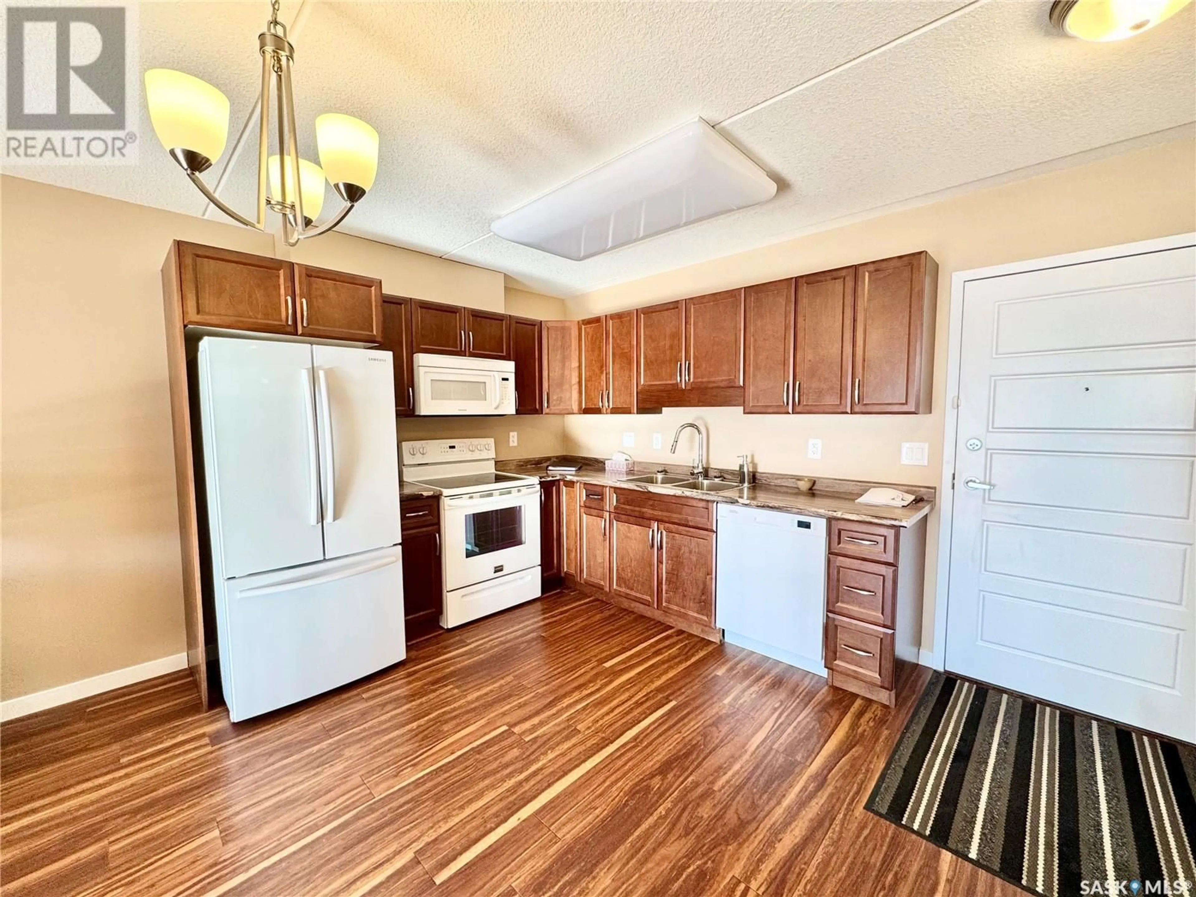 Standard kitchen, wood/laminate floor for 201 - 2761 WOODBRIDGE DRIVE, Prince Albert Saskatchewan S6V3Z9